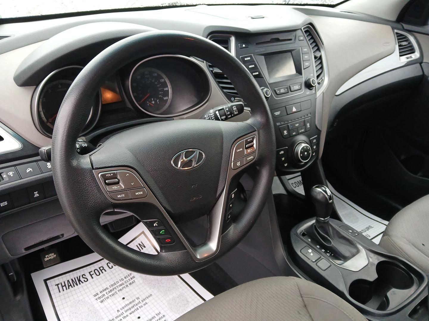 2016 Hyundai Santa Fe Sport 2.4 AWD (5XYZUDLB9GG) with an 2.4L L4 DOHC 16V engine, 6-Speed Automatic transmission, located at 401 Woodman Dr, Riverside, OH, 45431, (937) 908-9800, 39.760899, -84.123421 - 2016 Hyundai Santa Fe Sport 2.4 AWD - Photo#8