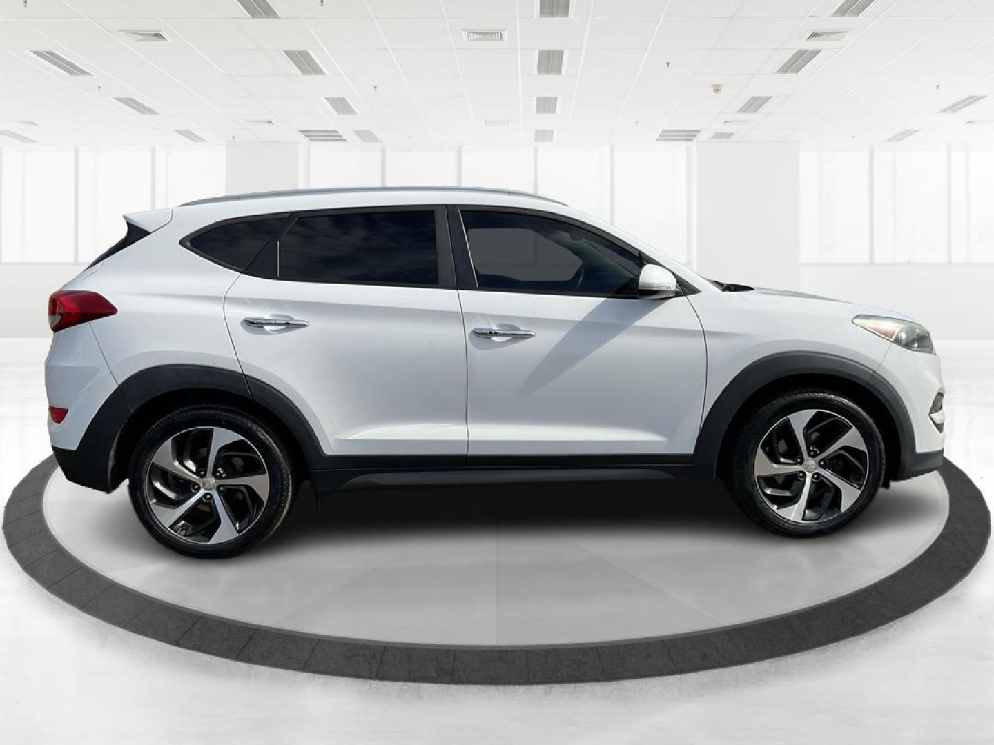 2016 Hyundai Tucson Limited (KM8J3CA20GU) with an 1.6L I-4 gasoline direct injection engine, located at 1099 N County Rd 25A, Troy, OH, 45373, (937) 908-9800, 40.057079, -84.212883 - 2016 Hyundai Tucson Limited - Photo#1