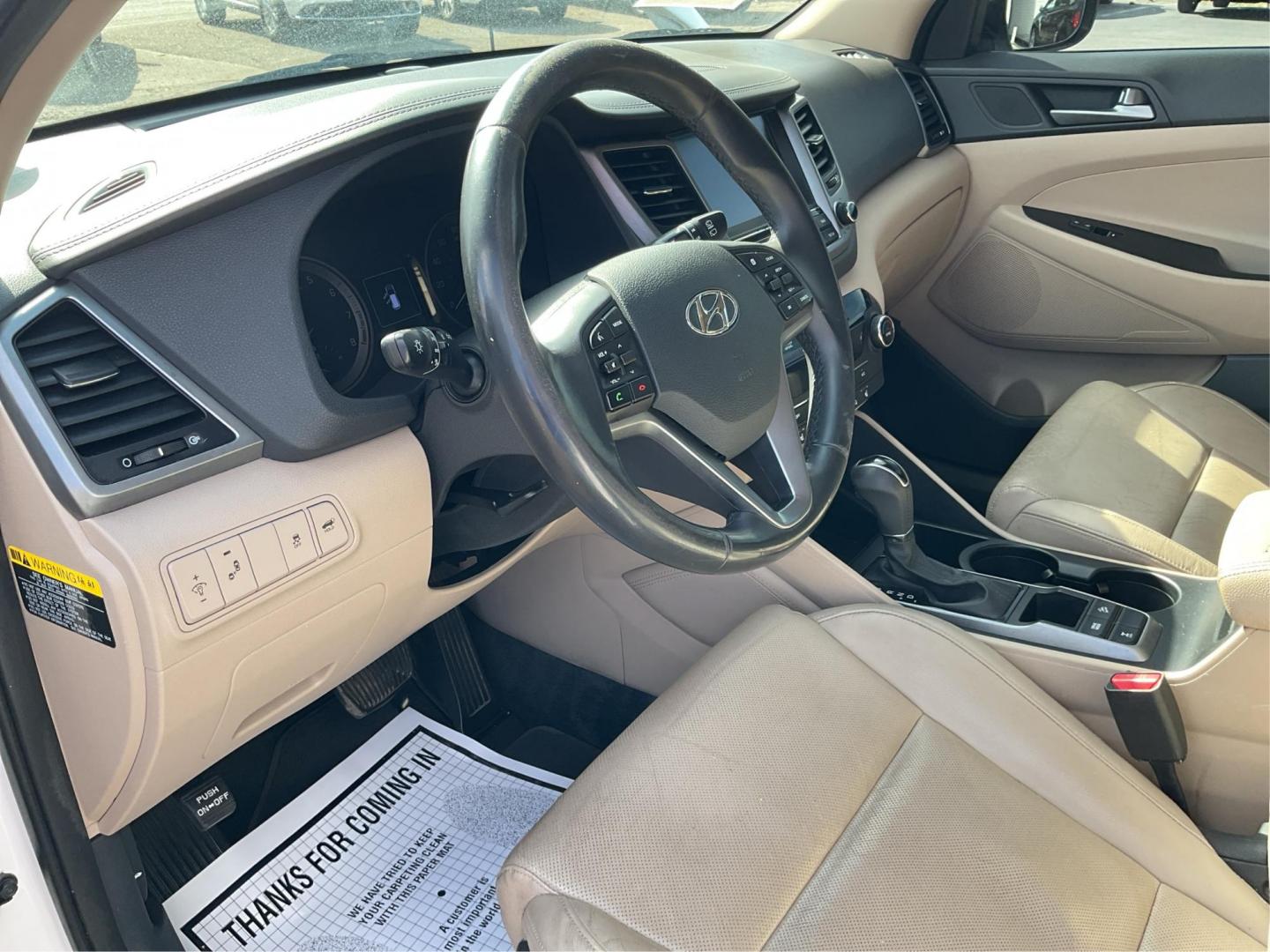2016 Hyundai Tucson Limited (KM8J3CA20GU) with an 1.6L I-4 gasoline direct injection engine, located at 1099 N County Rd 25A, Troy, OH, 45373, (937) 908-9800, 40.057079, -84.212883 - 2016 Hyundai Tucson Limited - Photo#8
