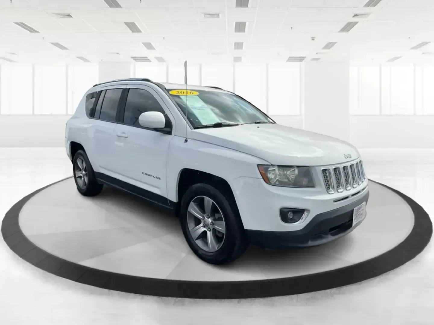 2016 Jeep Compass High Altitude Edition (1C4NJDEB6GD) with an 2.4L I-4 DOHC engine, located at 8750 N County Rd 25A, Piqua, OH, 45356, (937) 908-9800, 40.164391, -84.232513 - Are you ready to elevate your adventures and make every journey a memorable one? Introducing the 2016 Jeep Compass High Altitude Edition, your perfect companion for weekend getaways, daily commutes, or family road trips! At Advantage Car and Credit, located at 1184 Kauffman Ave, Fairborn, OH 45324, - Photo#0