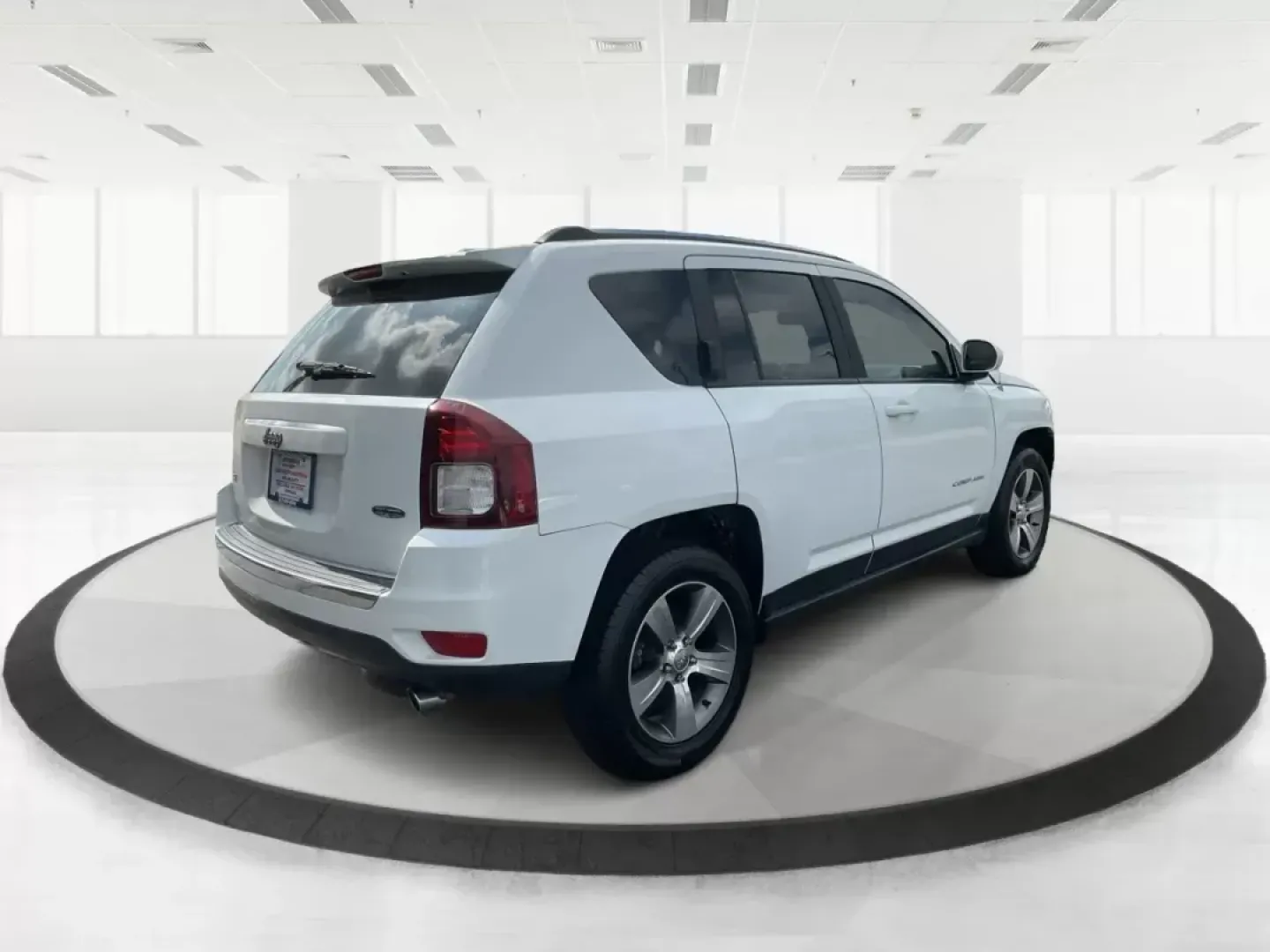 2016 Jeep Compass High Altitude Edition (1C4NJDEB6GD) with an 2.4L I-4 DOHC engine, located at 8750 N County Rd 25A, Piqua, OH, 45356, (937) 908-9800, 40.164391, -84.232513 - Are you ready to elevate your adventures and make every journey a memorable one? Introducing the 2016 Jeep Compass High Altitude Edition, your perfect companion for weekend getaways, daily commutes, or family road trips! At Advantage Car and Credit, located at 1184 Kauffman Ave, Fairborn, OH 45324, - Photo#2