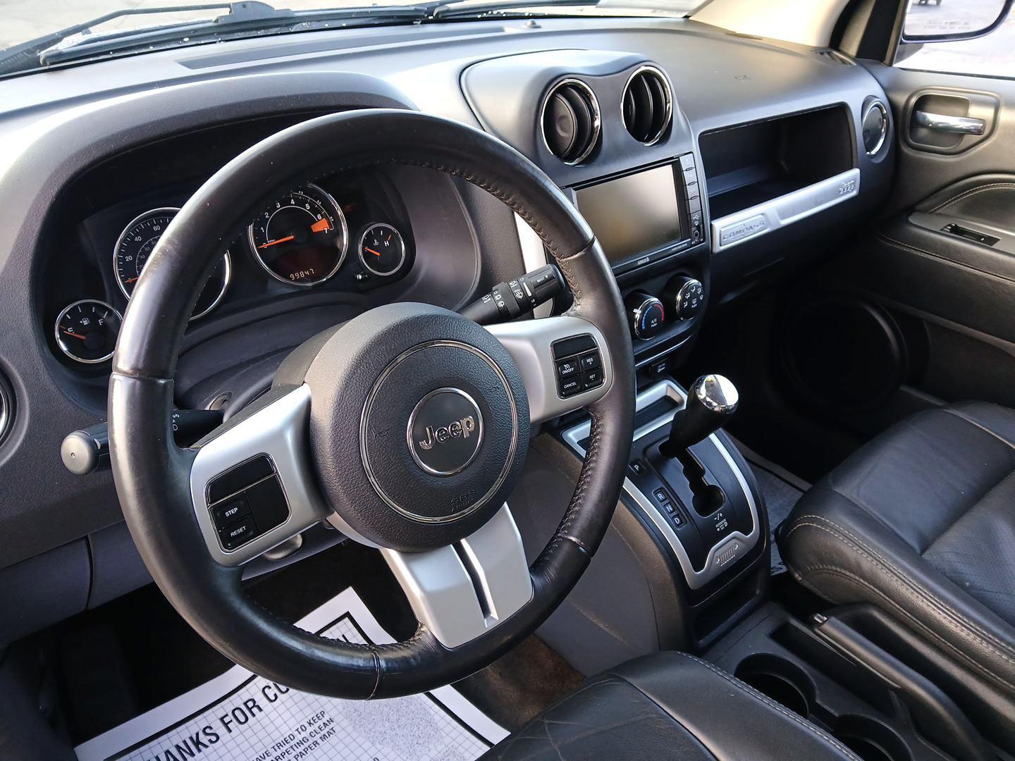 2016 Jeep Compass Latitude 4WD (1C4NJDEB7GD) with an 2.4L L4 DOHC 16V engine, 6-Speed Automatic transmission, located at 1099 N County Rd 25A, Troy, OH, 45373, (937) 908-9800, 40.057079, -84.212883 - 2016 Jeep Compass Latitude 4WD - Photo#8