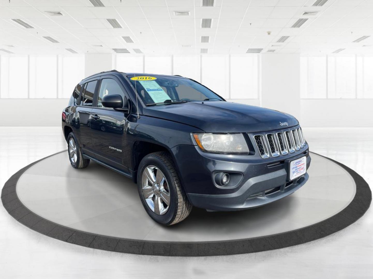 2016 Blue Jeep Compass Sport 4WD (1C4NJDBB5GD) with an 2.4L L4 DOHC 16V engine, located at 8750 N County Rd 25A, Piqua, OH, 45356, (937) 908-9800, 40.164391, -84.232513 - 2016 Jeep Compass Sport 4WD - Photo#0