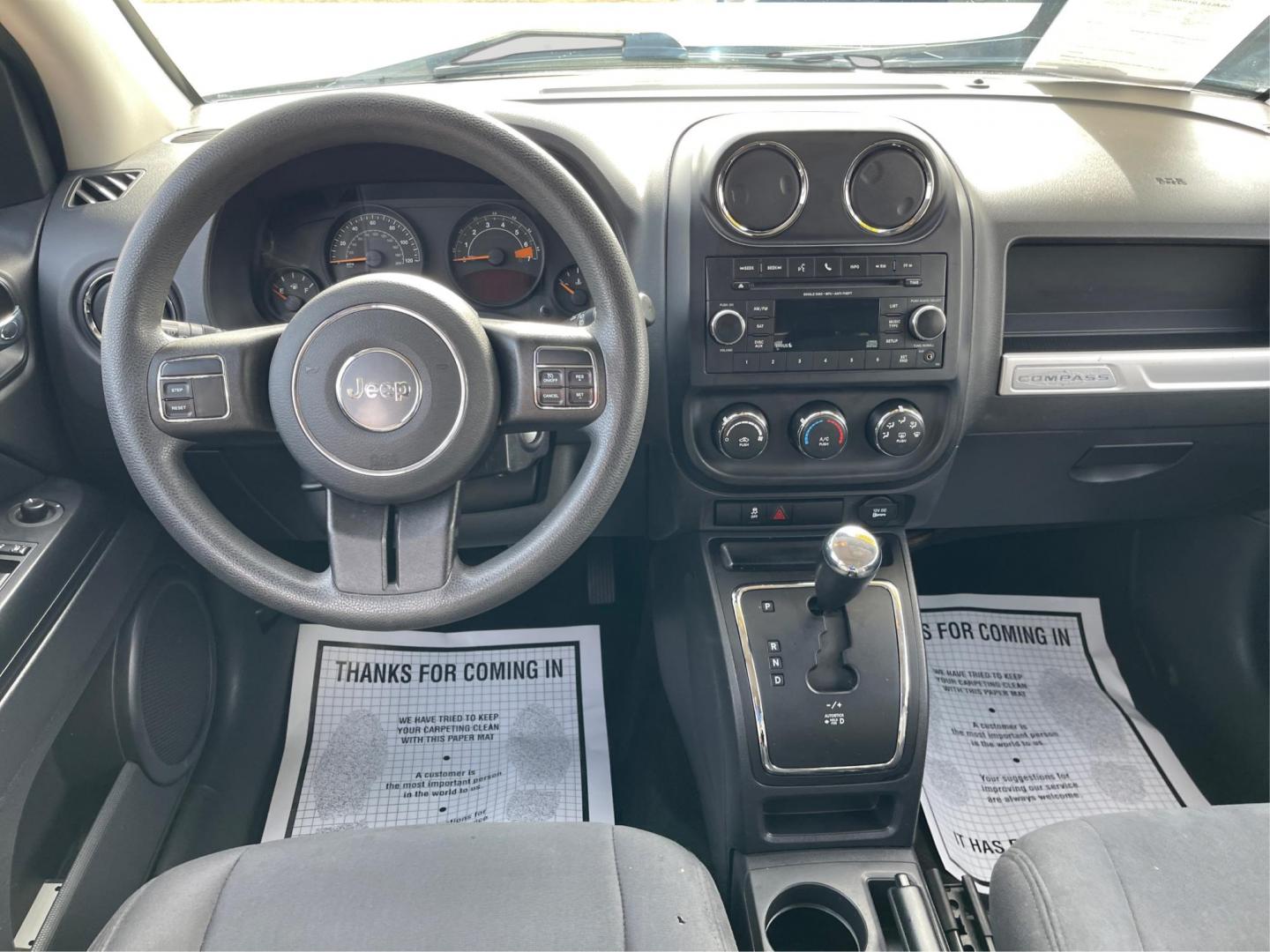 2016 Blue Jeep Compass Sport 4WD (1C4NJDBB5GD) with an 2.4L L4 DOHC 16V engine, located at 8750 N County Rd 25A, Piqua, OH, 45356, (937) 908-9800, 40.164391, -84.232513 - 2016 Jeep Compass Sport 4WD - Photo#18