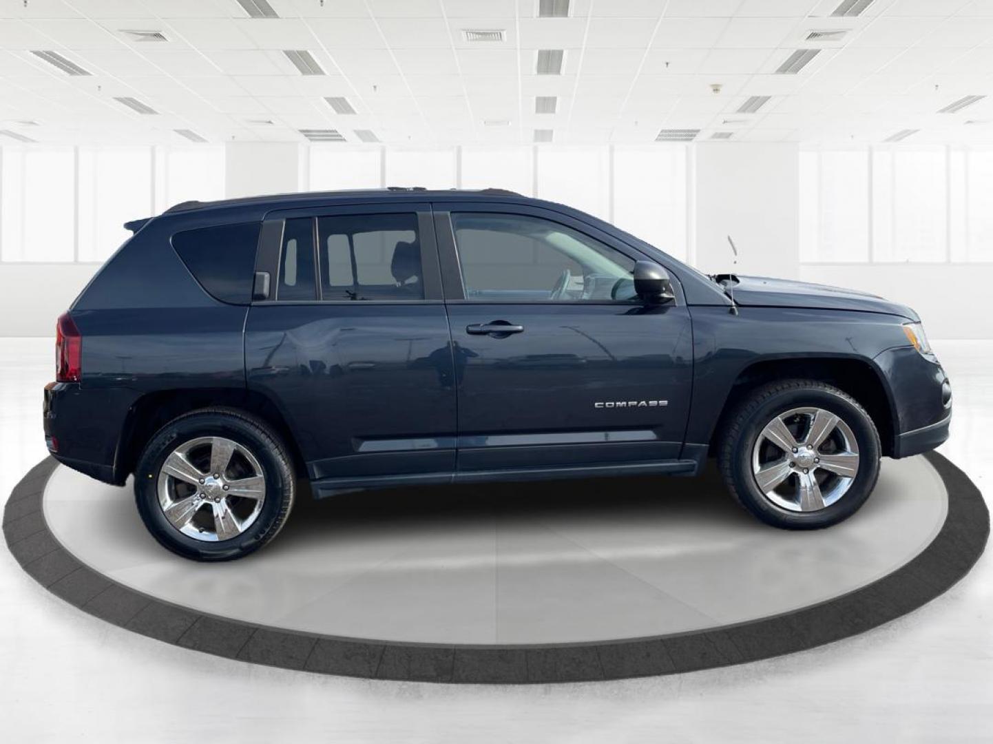 2016 Blue Jeep Compass Sport 4WD (1C4NJDBB5GD) with an 2.4L L4 DOHC 16V engine, located at 8750 N County Rd 25A, Piqua, OH, 45356, (937) 908-9800, 40.164391, -84.232513 - 2016 Jeep Compass Sport 4WD - Photo#1