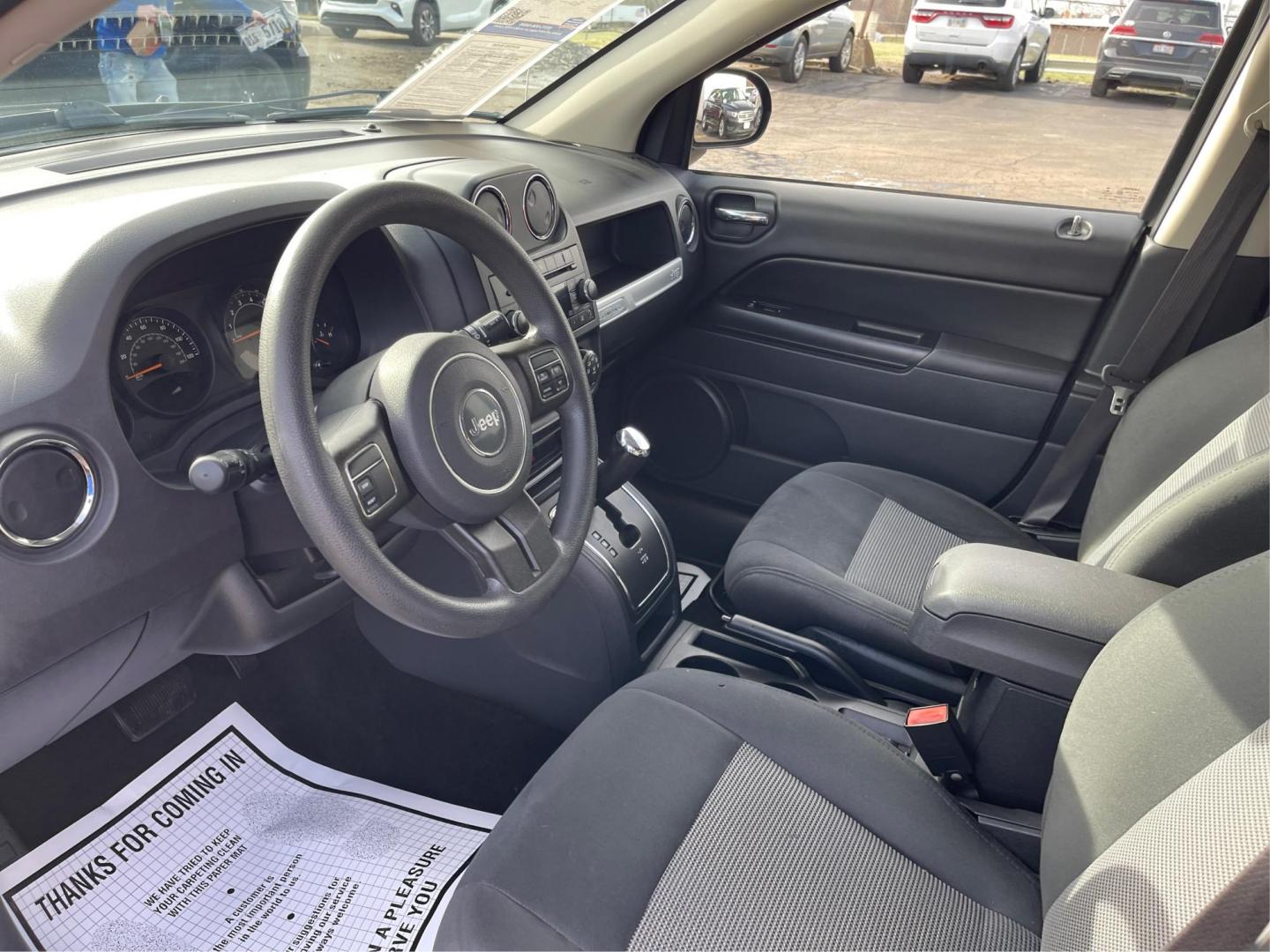 2016 Blue Jeep Compass Sport 4WD (1C4NJDBB5GD) with an 2.4L L4 DOHC 16V engine, located at 8750 N County Rd 25A, Piqua, OH, 45356, (937) 908-9800, 40.164391, -84.232513 - 2016 Jeep Compass Sport 4WD - Photo#8