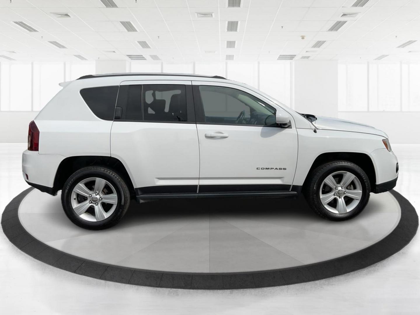 2016 Jeep Compass Latitude (1C4NJDEB9GD) with an 2.4L I-4 DOHC engine, located at 401 Woodman Dr, Riverside, OH, 45431, (937) 908-9800, 39.760899, -84.123421 - 2016 Jeep Compass Latitude - Photo#1