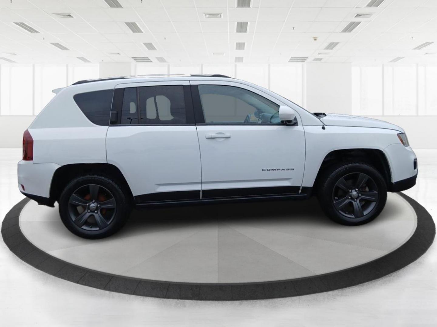 2016 Jeep Compass Latitude FWD (1C4NJCEA3GD) with an 2.0L L4 DOHC 16V engine, Continuously Variable Transmission transmission, located at 1951 S Dayton Lakeview Rd., New Carlisle, OH, 45344, (937) 908-9800, 39.890999, -84.050255 - 2016 Jeep Compass Latitude FWD - Photo#1