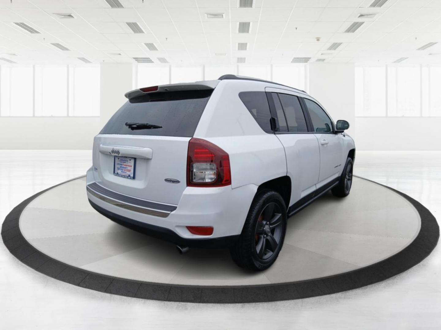 2016 Jeep Compass Latitude FWD (1C4NJCEA3GD) with an 2.0L L4 DOHC 16V engine, Continuously Variable Transmission transmission, located at 1951 S Dayton Lakeview Rd., New Carlisle, OH, 45344, (937) 908-9800, 39.890999, -84.050255 - 2016 Jeep Compass Latitude FWD - Photo#2