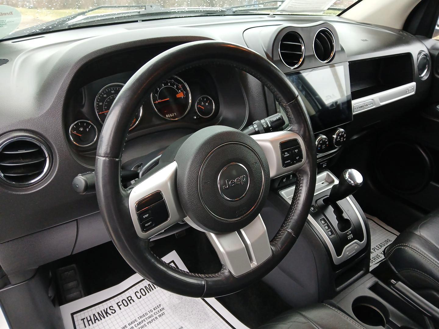 2016 Jeep Compass Latitude FWD (1C4NJCEA3GD) with an 2.0L L4 DOHC 16V engine, Continuously Variable Transmission transmission, located at 1951 S Dayton Lakeview Rd., New Carlisle, OH, 45344, (937) 908-9800, 39.890999, -84.050255 - 2016 Jeep Compass Latitude FWD - Photo#8