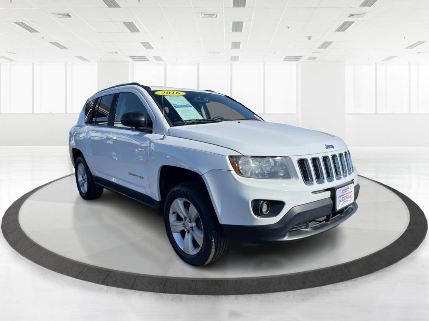 2016 Jeep Compass Sport (1C4NJCBA1GD) with an Other engine, located at 880 E. National Road, Vandalia, OH, 45377, (937) 908-9800, 39.891918, -84.183594 - 2016 Jeep Compass Sport - Photo#0