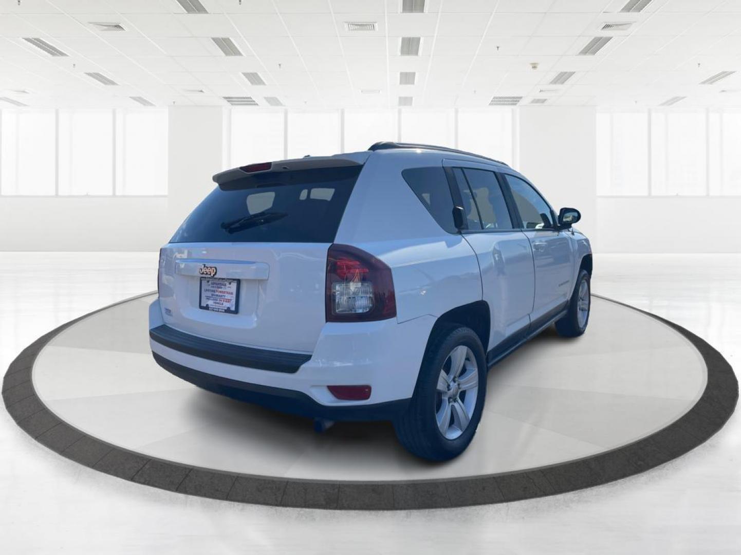 2016 Jeep Compass Sport (1C4NJCBA1GD) with an Other engine, located at 880 E. National Road, Vandalia, OH, 45377, (937) 908-9800, 39.891918, -84.183594 - 2016 Jeep Compass Sport - Photo#2