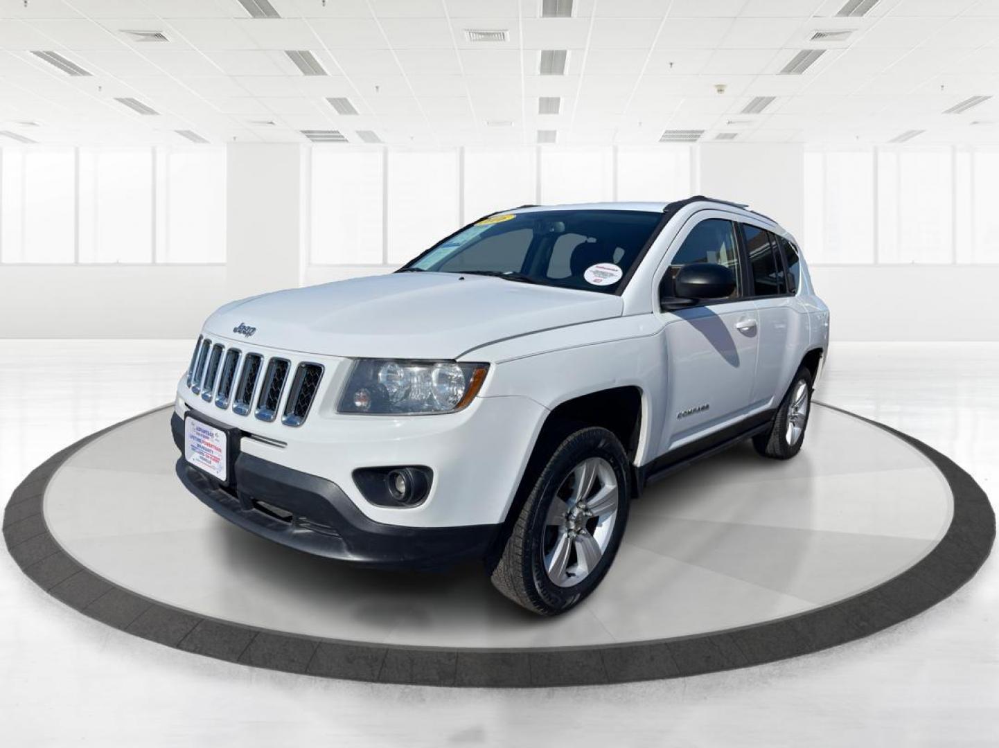 2016 Jeep Compass Sport (1C4NJCBA1GD) with an Other engine, located at 880 E. National Road, Vandalia, OH, 45377, (937) 908-9800, 39.891918, -84.183594 - 2016 Jeep Compass Sport - Photo#7