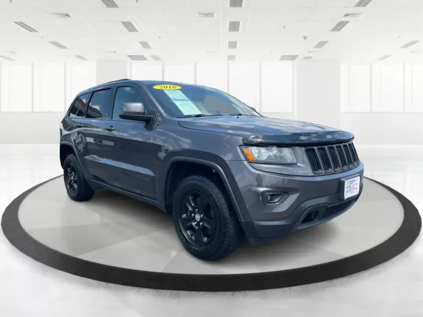 2016 Jeep Grand Cherokee Laredo (1C4RJFAG8GC) with an Pentastar 3.6L V-6 DOHC engine, located at 880 E. National Road, Vandalia, OH, 45377, (937) 908-9800, 39.891918, -84.183594 - **Elevate Your Adventures with the 2016 Jeep Grand Cherokee Laredo!**<br /> <br /> Are you ready to embark on your next adventure? Whether you're a growing family needing more space for weekend getaways or a commuter seeking a reliable ride for daily travels, the 2016 Jeep Grand Cherokee Laredo is y - Photo#0
