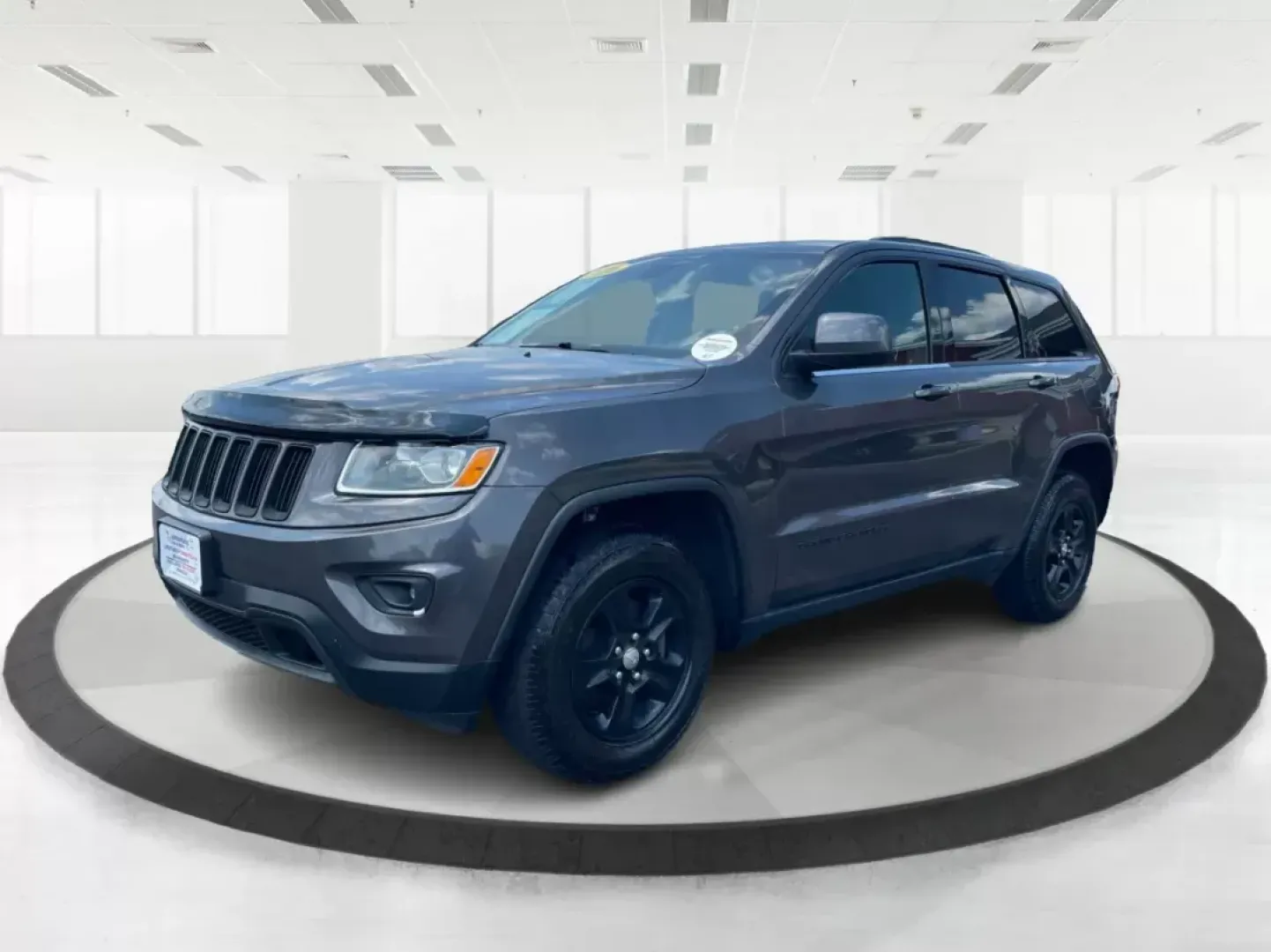 2016 Jeep Grand Cherokee Laredo (1C4RJFAG8GC) with an Pentastar 3.6L V-6 DOHC engine, located at 880 E. National Road, Vandalia, OH, 45377, (937) 908-9800, 39.891918, -84.183594 - **Elevate Your Adventures with the 2016 Jeep Grand Cherokee Laredo!**<br /> <br /> Are you ready to embark on your next adventure? Whether you're a growing family needing more space for weekend getaways or a commuter seeking a reliable ride for daily travels, the 2016 Jeep Grand Cherokee Laredo is y - Photo#7