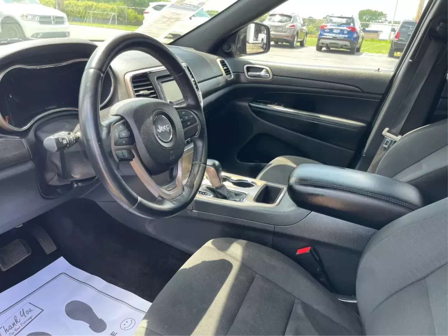 2016 Jeep Grand Cherokee Laredo (1C4RJFAG8GC) with an Pentastar 3.6L V-6 DOHC engine, located at 880 E. National Road, Vandalia, OH, 45377, (937) 908-9800, 39.891918, -84.183594 - **Elevate Your Adventures with the 2016 Jeep Grand Cherokee Laredo!**<br /> <br /> Are you ready to embark on your next adventure? Whether you're a growing family needing more space for weekend getaways or a commuter seeking a reliable ride for daily travels, the 2016 Jeep Grand Cherokee Laredo is y - Photo#8