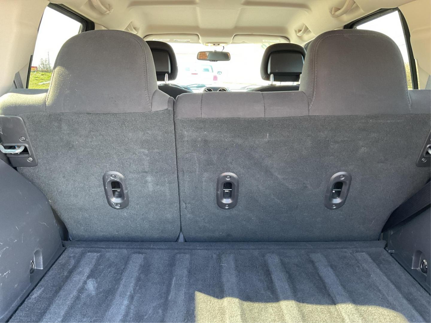 2016 Jeep Patriot Sport (1C4NJRBB0GD) with an 2.4L I-4 DOHC engine, located at 8750 N County Rd 25A, Piqua, OH, 45356, (937) 908-9800, 40.164391, -84.232513 - 2016 Jeep Patriot Sport - Photo#9