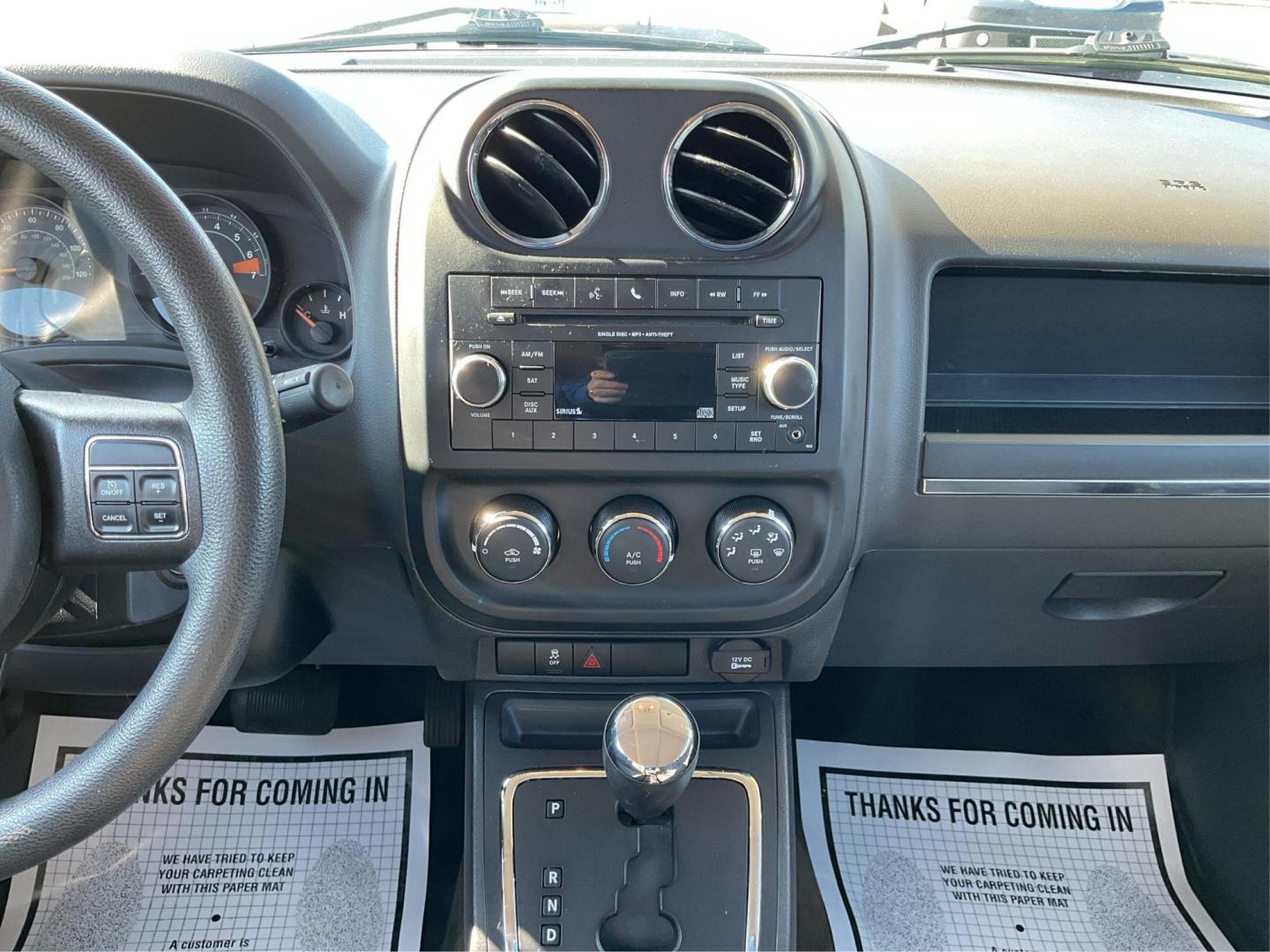 2016 Jeep Patriot Sport (1C4NJRBB0GD) with an 2.4L I-4 DOHC engine, located at 8750 N County Rd 25A, Piqua, OH, 45356, (937) 908-9800, 40.164391, -84.232513 - 2016 Jeep Patriot Sport - Photo#10