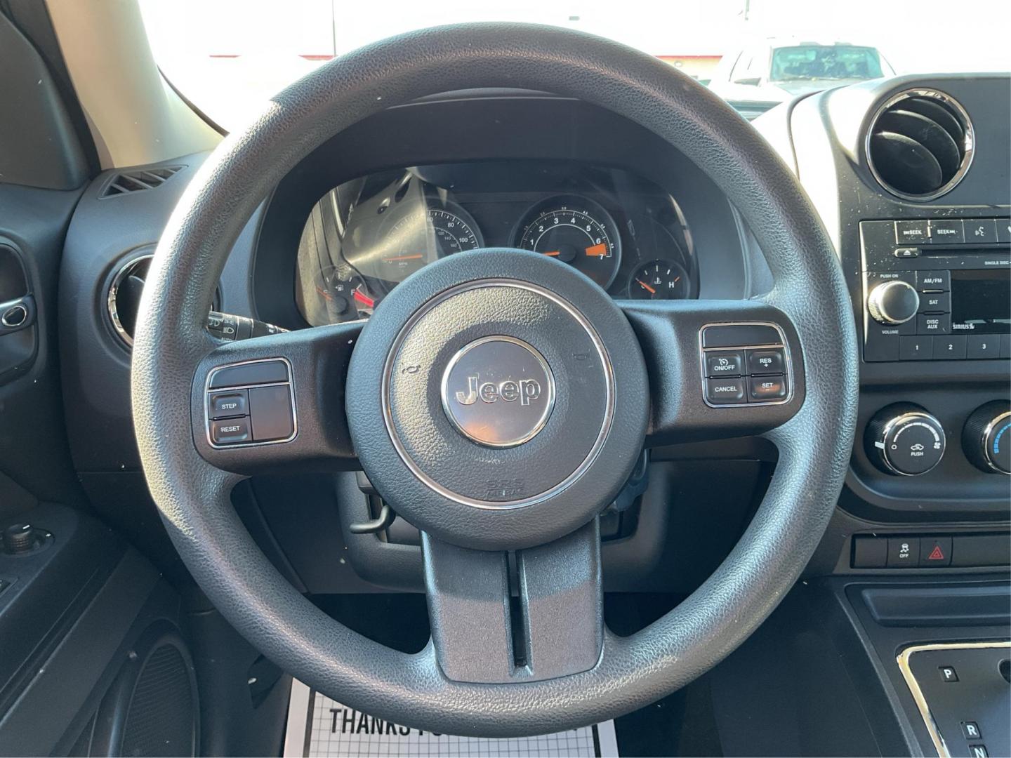 2016 Jeep Patriot Sport (1C4NJRBB0GD) with an 2.4L I-4 DOHC engine, located at 8750 N County Rd 25A, Piqua, OH, 45356, (937) 908-9800, 40.164391, -84.232513 - 2016 Jeep Patriot Sport - Photo#13
