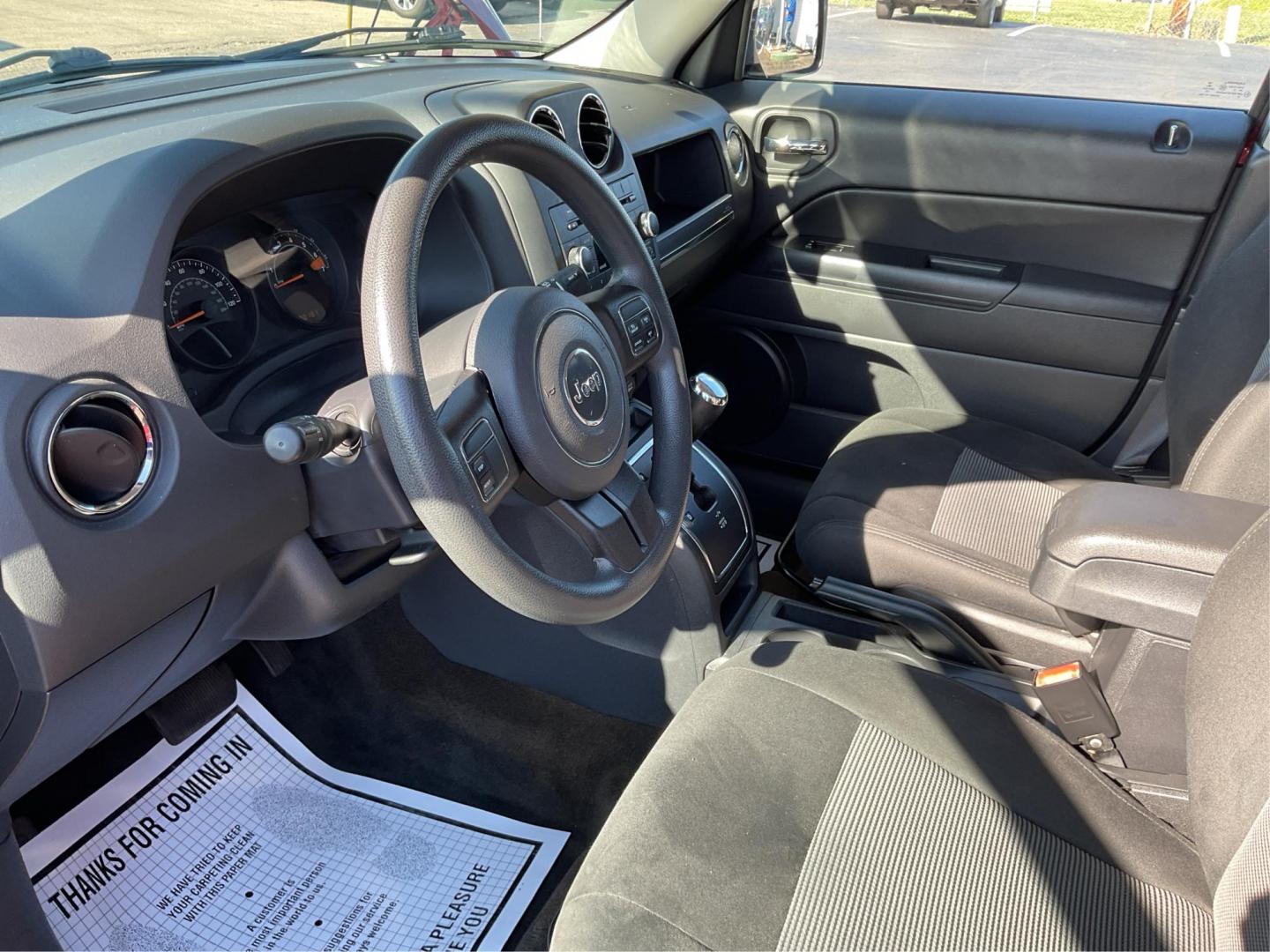 2016 Jeep Patriot Sport (1C4NJRBB0GD) with an 2.4L I-4 DOHC engine, located at 8750 N County Rd 25A, Piqua, OH, 45356, (937) 908-9800, 40.164391, -84.232513 - 2016 Jeep Patriot Sport - Photo#6