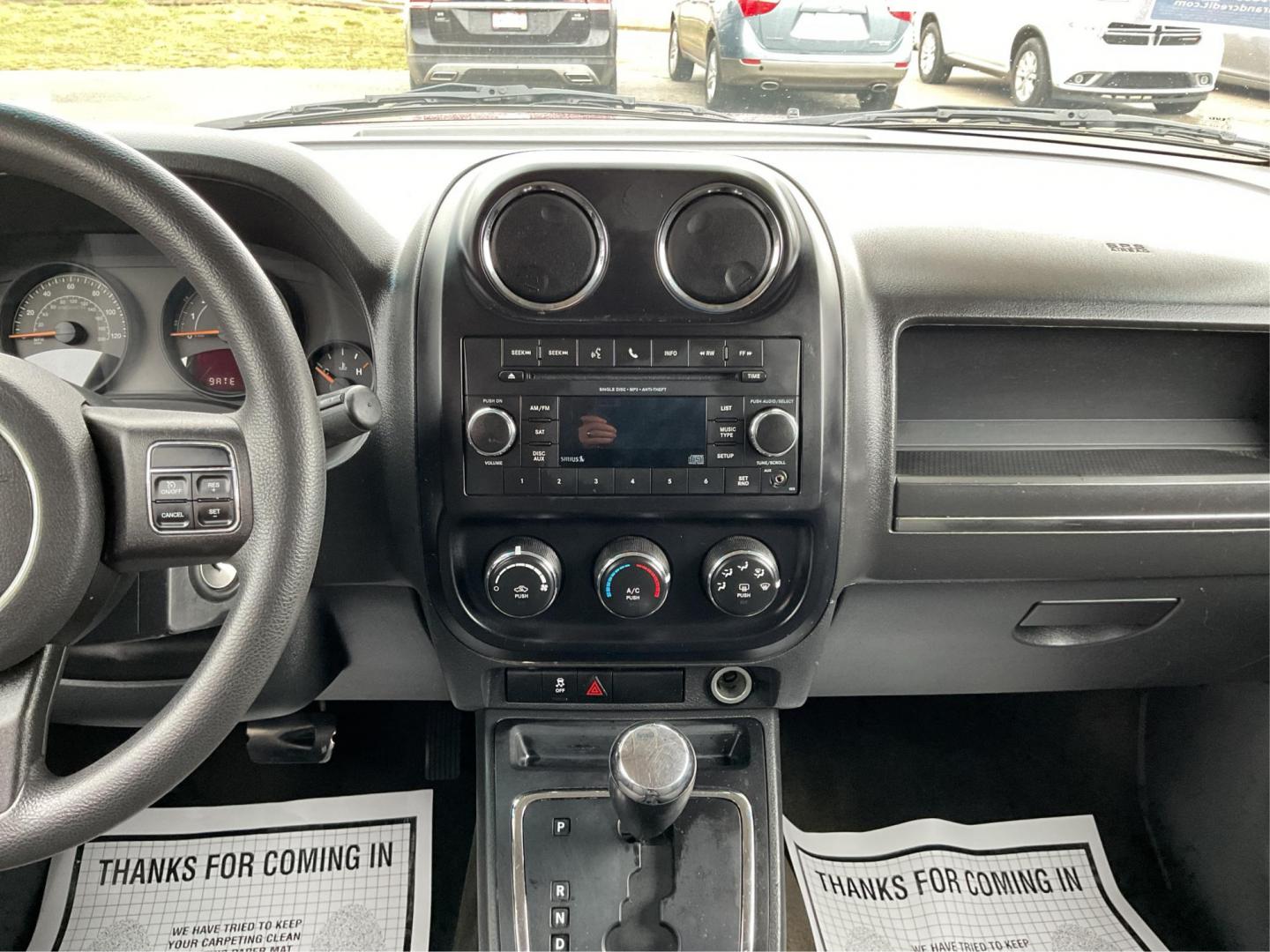 2016 Jeep Patriot Sport 2WD (1C4NJPBA4GD) with an 2.0L L4 DOHC 16V engine, located at 401 Woodman Dr, Riverside, OH, 45431, (937) 908-9800, 39.760899, -84.123421 - 2016 Jeep Patriot Sport 2WD - Photo#11