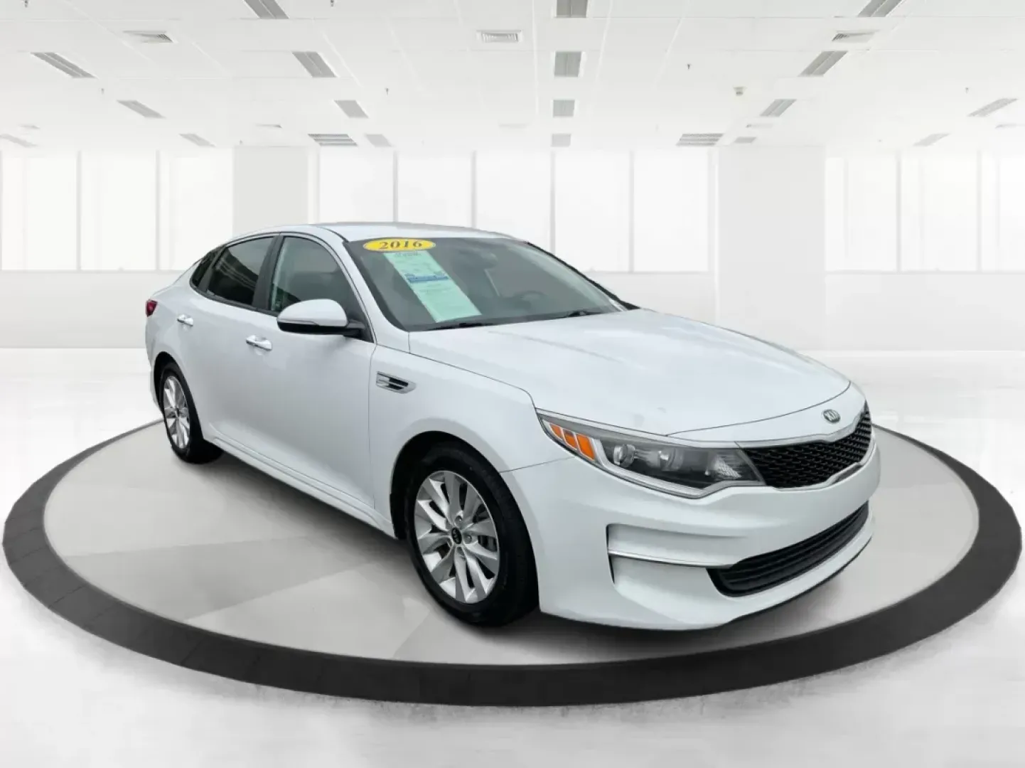 2016 Kia Optima LX (5XXGT4L32GG) with an Theta II 2.4L I-4 gasoline direct injection engine, located at 8750 N County Rd 25A, Piqua, OH, 45356, (937) 908-9800, 40.164391, -84.232513 - 2016 Kia Optima LX - Photo#0
