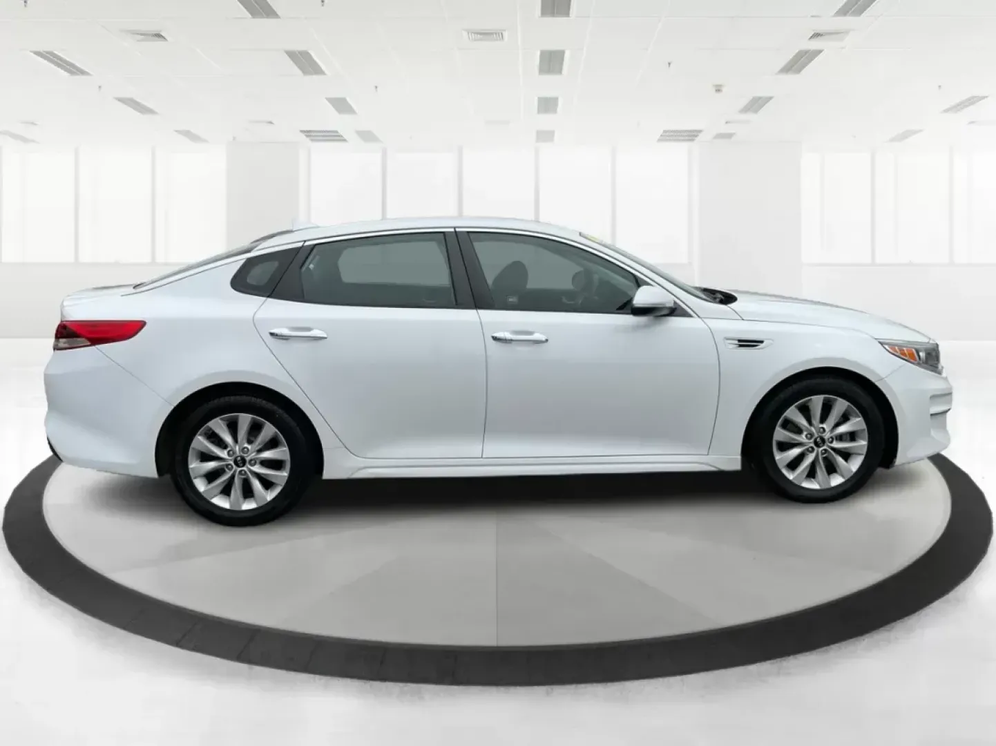 2016 Kia Optima LX (5XXGT4L32GG) with an Theta II 2.4L I-4 gasoline direct injection engine, located at 8750 N County Rd 25A, Piqua, OH, 45356, (937) 908-9800, 40.164391, -84.232513 - 2016 Kia Optima LX - Photo#1