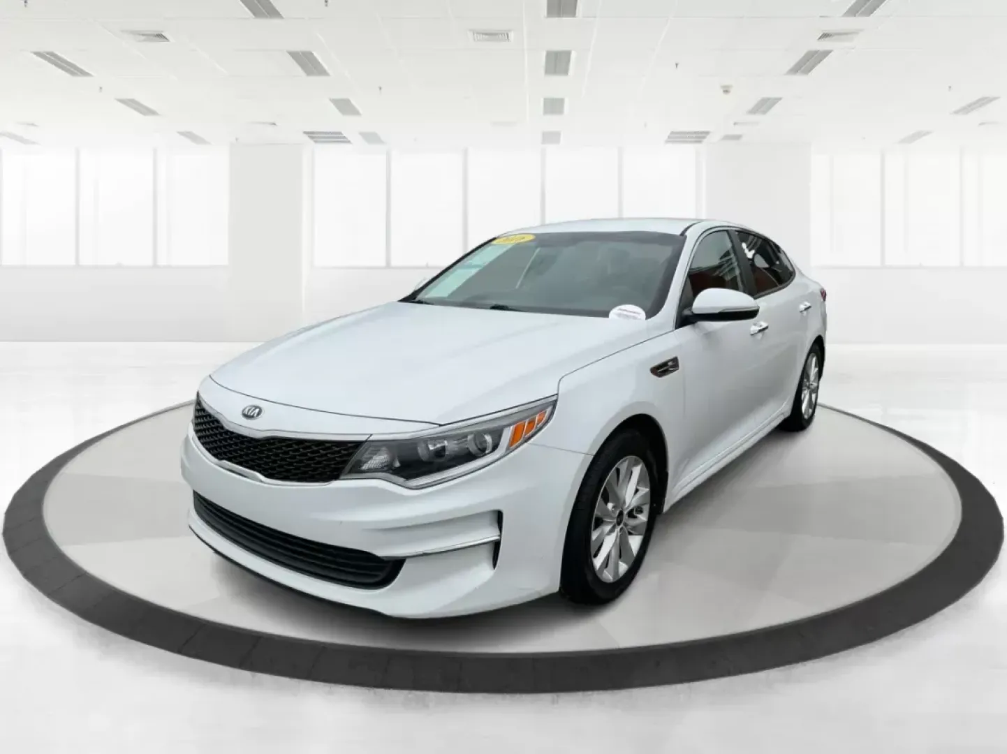 2016 Kia Optima LX (5XXGT4L32GG) with an Theta II 2.4L I-4 gasoline direct injection engine, located at 8750 N County Rd 25A, Piqua, OH, 45356, (937) 908-9800, 40.164391, -84.232513 - 2016 Kia Optima LX - Photo#8