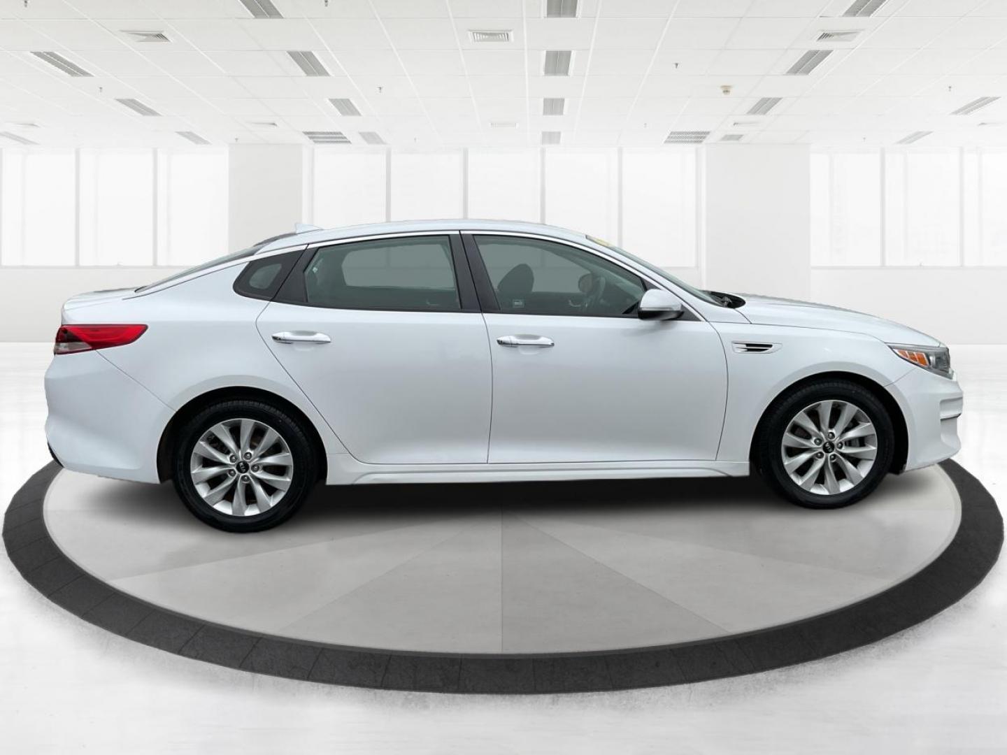 2016 Kia Optima LX (5XXGT4L32GG) with an Theta II 2.4L I-4 gasoline direct injection engine, located at 8750 N County Rd 25A, Piqua, OH, 45356, (937) 908-9800, 40.164391, -84.232513 - 2016 Kia Optima LX - Photo#1