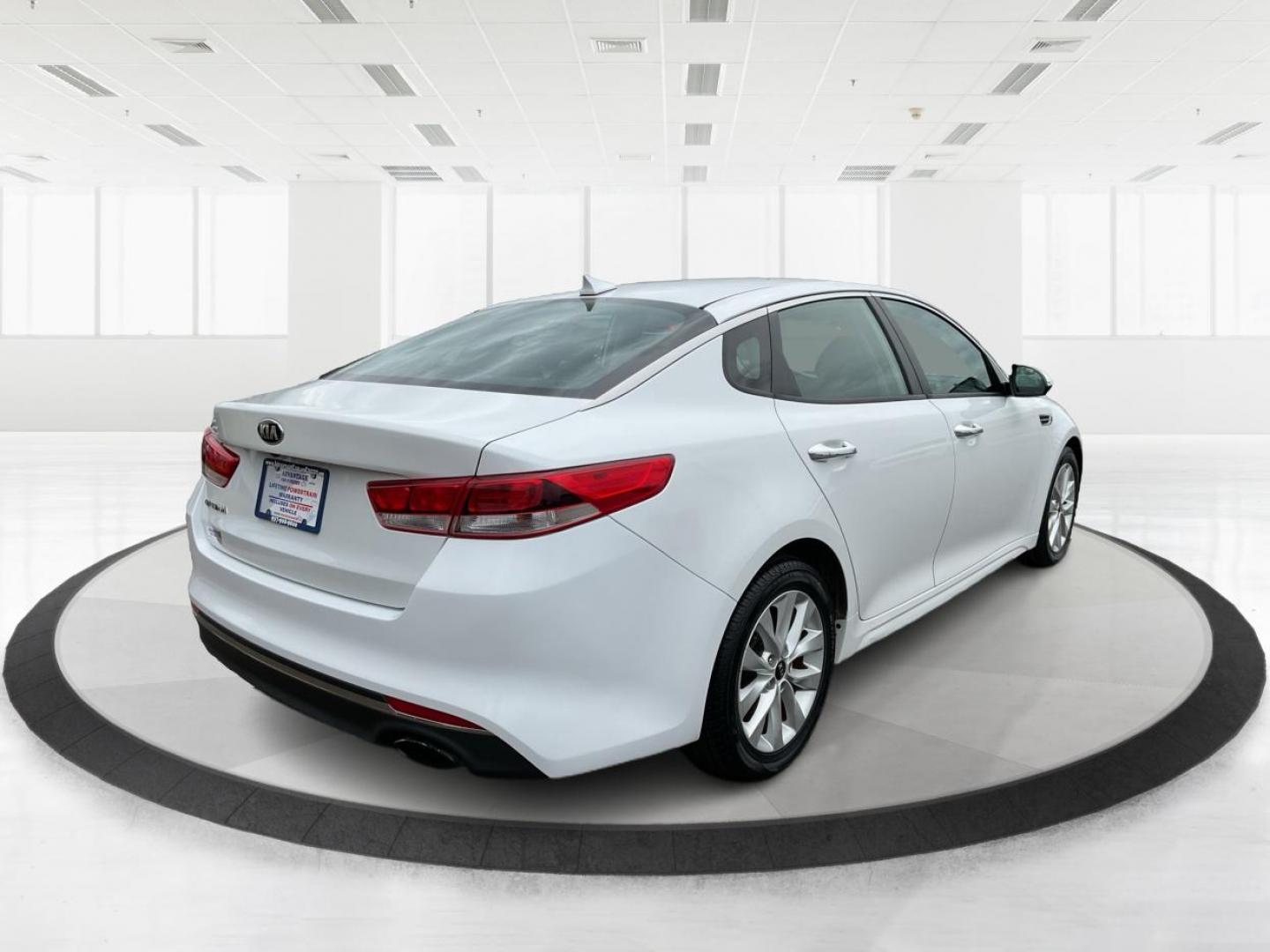 2016 Kia Optima LX (5XXGT4L32GG) with an Theta II 2.4L I-4 gasoline direct injection engine, located at 8750 N County Rd 25A, Piqua, OH, 45356, (937) 908-9800, 40.164391, -84.232513 - 2016 Kia Optima LX - Photo#2