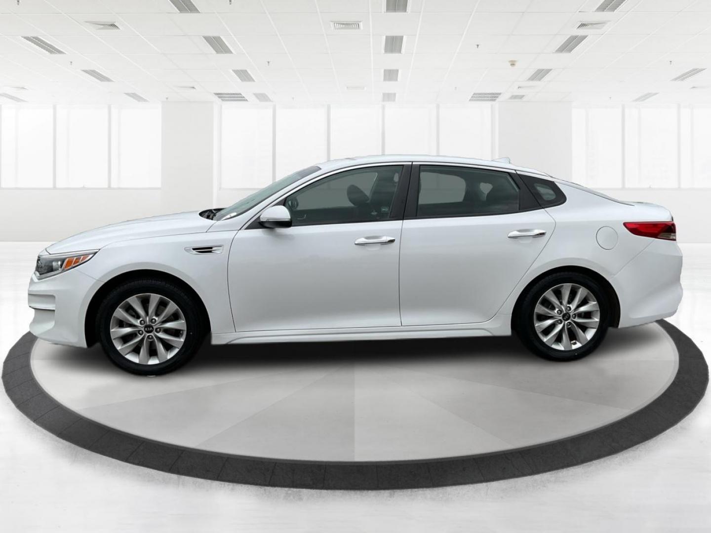 2016 Kia Optima LX (5XXGT4L32GG) with an Theta II 2.4L I-4 gasoline direct injection engine, located at 8750 N County Rd 25A, Piqua, OH, 45356, (937) 908-9800, 40.164391, -84.232513 - 2016 Kia Optima LX - Photo#6