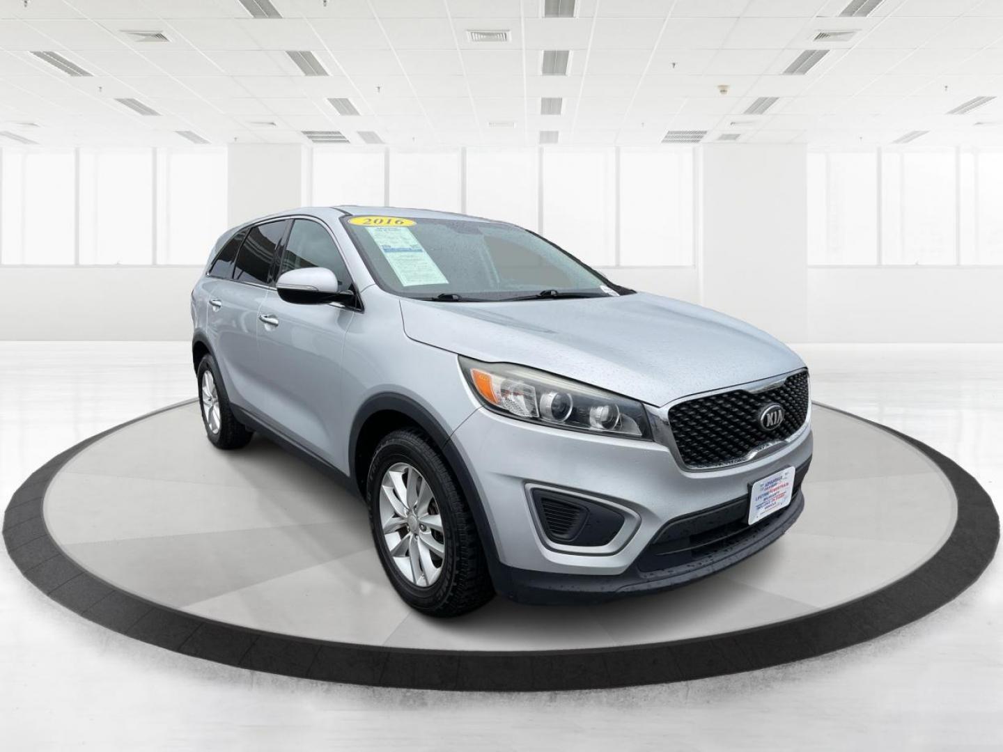 2016 Sparkling Silver Kia Sorento L 2WD (5XYPG4A31GG) with an 2.4L L4 DOHC 16V engine, 6-Speed Automatic transmission, located at 4508 South Dixie Dr, Moraine, OH, 45439, (937) 908-9800, 39.689976, -84.218452 - 2016 Kia Sorento L 2WD - Photo#0
