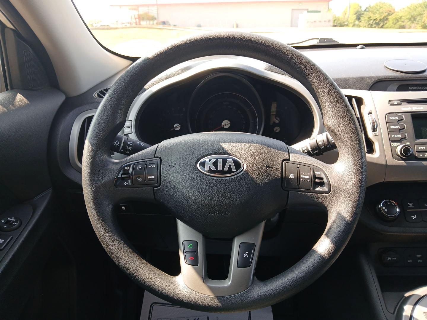 2016 Kia Sportage LX FWD (KNDPB3AC7G7) with an 2.4L V6 DOHC 24V engine, 6-Speed Automatic transmission, located at 8750 N County Rd 25A, Piqua, OH, 45356, (937) 908-9800, 40.164391, -84.232513 - 2016 Kia Sportage LX FWD - Photo#15