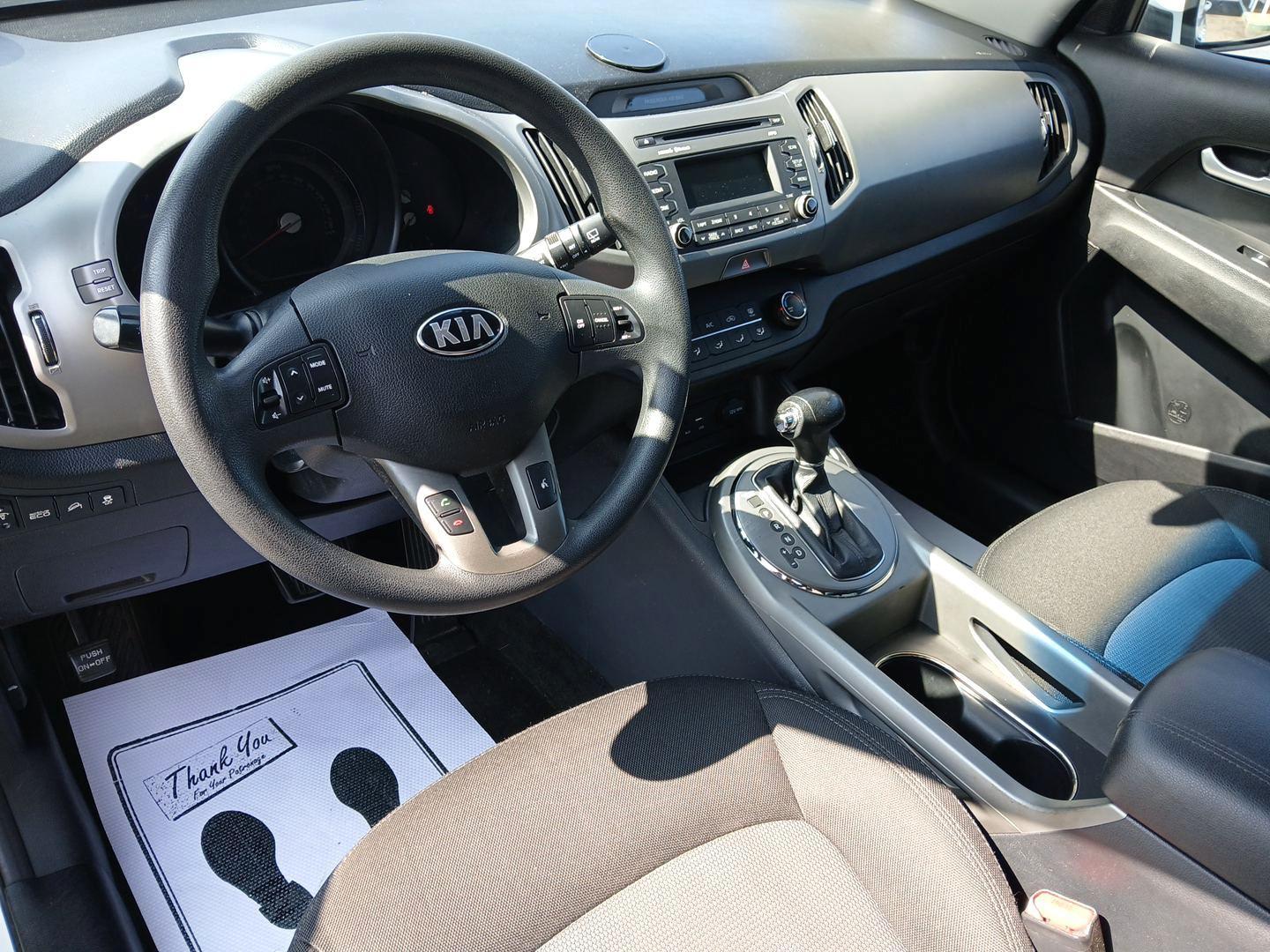 2016 Kia Sportage LX FWD (KNDPB3AC7G7) with an 2.4L V6 DOHC 24V engine, 6-Speed Automatic transmission, located at 8750 N County Rd 25A, Piqua, OH, 45356, (937) 908-9800, 40.164391, -84.232513 - 2016 Kia Sportage LX FWD - Photo#8