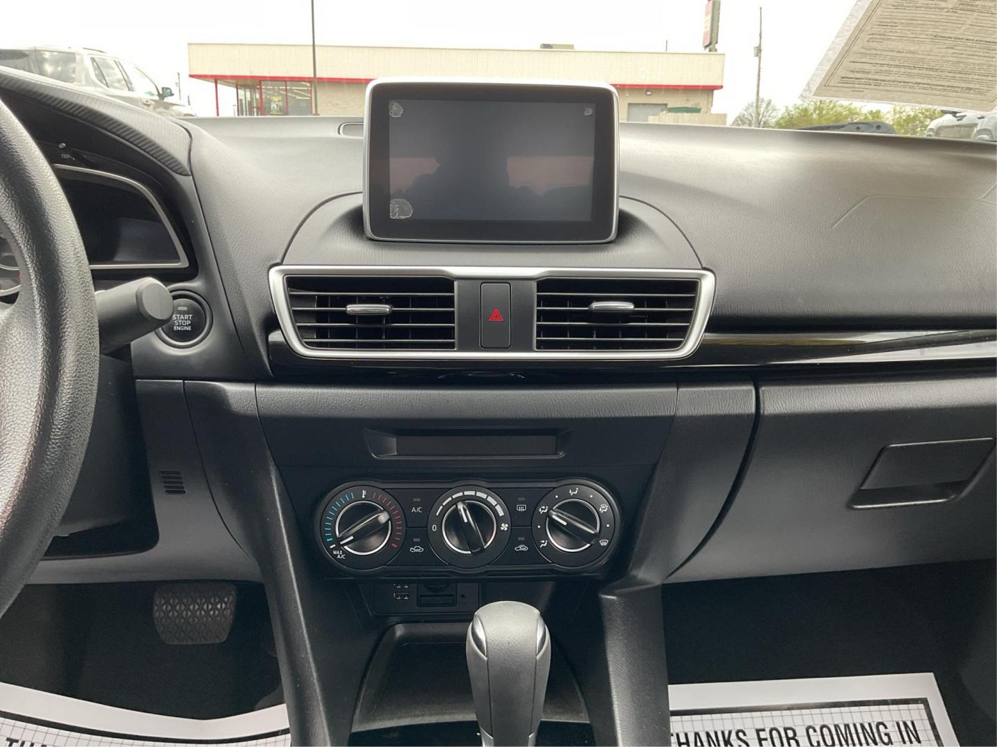 2016 Mazda MAZDA3 i Sport AT 4-Door (JM1BM1U74G1) with an 2.0L L4 DOHC 16V engine, 6-Speed Automatic transmission, located at 8750 N County Rd 25A, Piqua, OH, 45356, (937) 908-9800, 40.164391, -84.232513 - 2016 Mazda MAZDA3 i Sport AT 4-Door - Photo#12