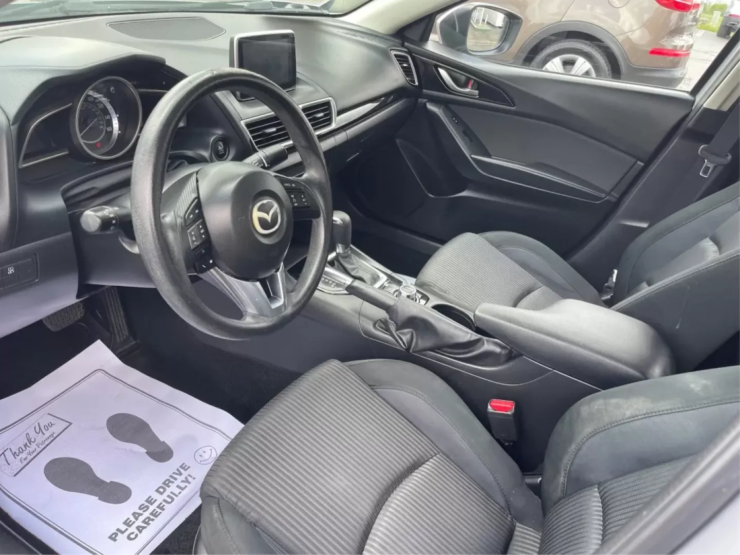 2016 Mazda Mazda3 i Sport (JM1BM1U73G1) with an SKYACTIV-G 2L I-4 gasoline direct injection engine, located at 1184 Kauffman Ave, Fairborn, OH, 45324, (937) 908-9800, 39.807072, -84.030914 - Experience a new level of driving with the 2016 Mazda3 i Sport, available now at Advantage Car and Credit in Fairborn, OH. This stylish sedan is more than just a mode of transportation; it's your perfect companion for everything from daily commutes to weekend road trips. With an impressive fuel-effi - Photo#8