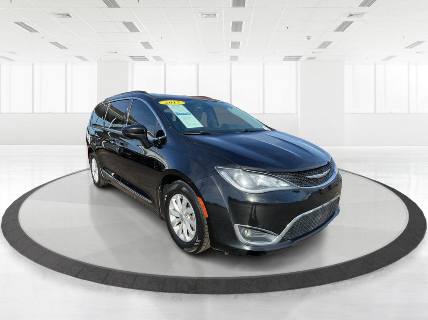 2017 Chrysler Pacifica Touring-L (2C4RC1BG7HR) with an 3.6L V-6 DOHC engine, located at 880 E. National Road, Vandalia, OH, 45377, (937) 908-9800, 39.891918, -84.183594 - 2017 Chrysler Pacifica Touring-L - Photo#0