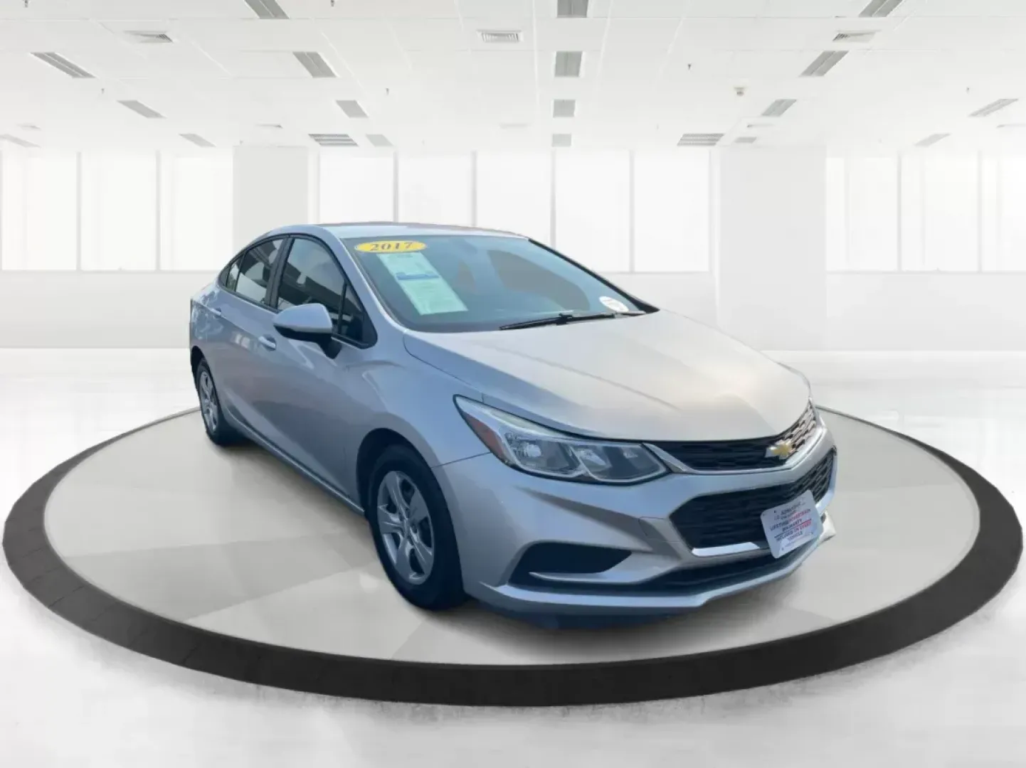 2017 Chevrolet Cruze LS Auto (1G1BC5SM0H7) with an 1.4L I-4 gasoline direct injection engine, located at 8750 N County Rd 25A, Piqua, OH, 45356, (937) 908-9800, 40.164391, -84.232513 - **Discover Your Perfect Ride: 2017 Chevrolet Cruze LS Auto for Your Daily Adventures!**<br /> <br /> Are you searching for a reliable and stylish sedan that accommodates your busy lifestyle? Look no further! The 2017 Chevrolet Cruze LS Auto is the ideal vehicle for daily commuters, growing families, - Photo#0