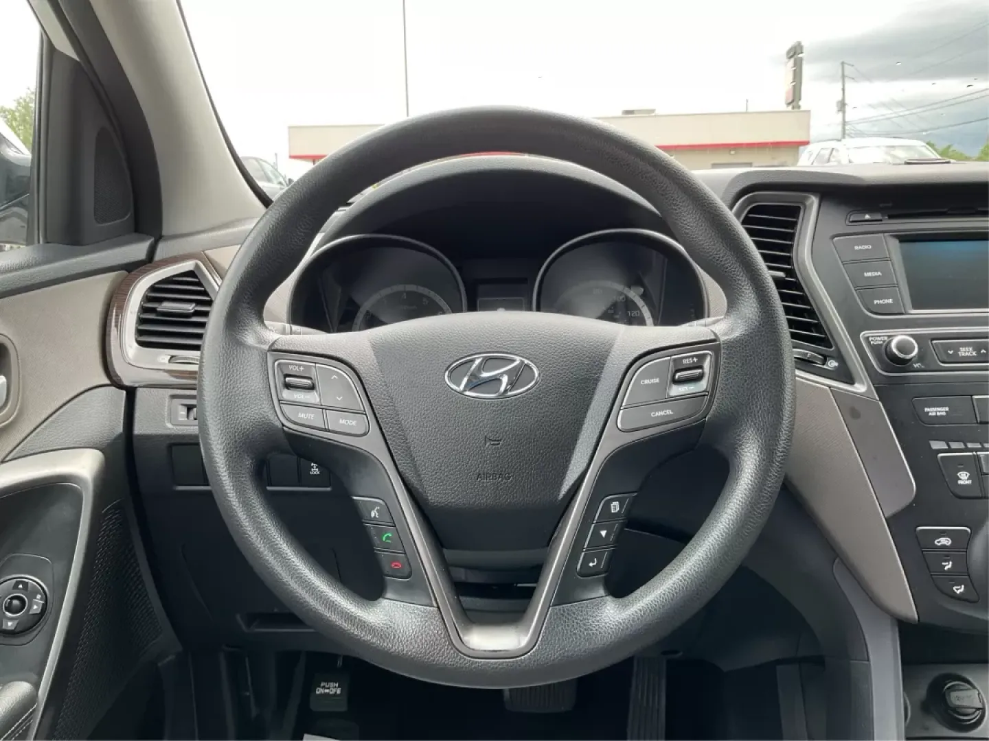 2017 Hyundai Santa Fe 2.4L (5NMZTDLB4HH) with an Theta II 2.4L I-4 gasoline direct injection engine, located at 880 E. National Road, Vandalia, OH, 45377, (937) 908-9800, 39.891918, -84.183594 - **Discover Your Next Adventure with the 2017 Hyundai Santa Fe Sport at Advantage Car and Credit!**<br /> <br /> Are you ready to elevate your lifestyle and embrace the adventures waiting for you? Whether you're a growing family in need of space, a daily commuter looking for comfort, or an outdoor en - Photo#16