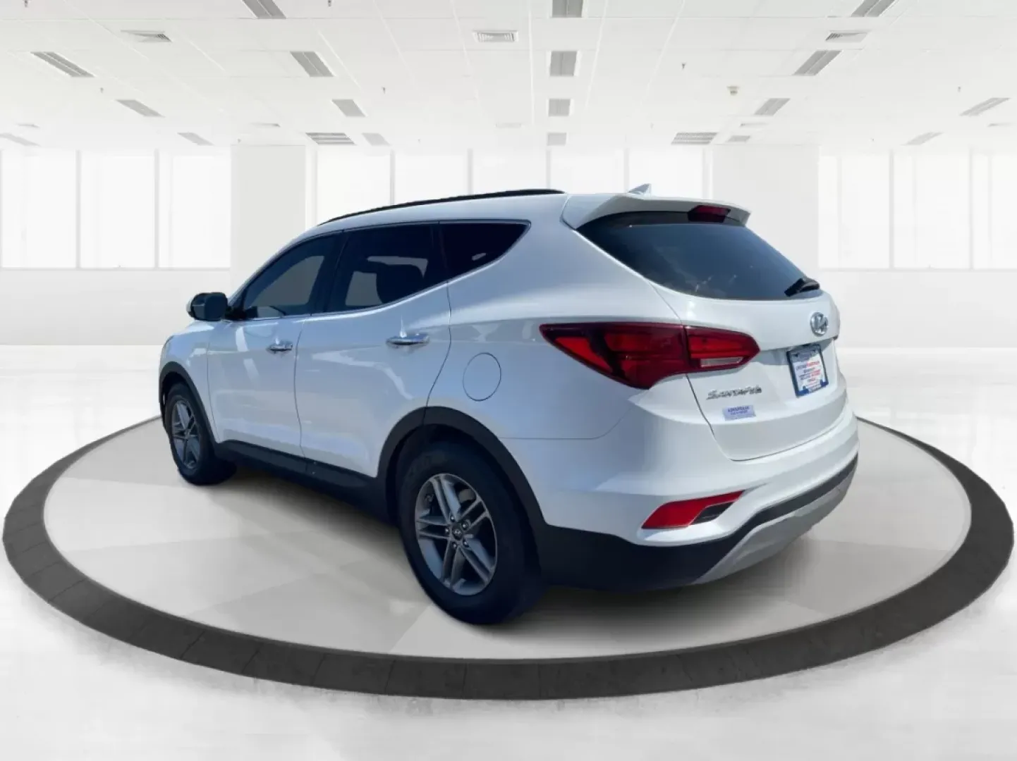 2017 Hyundai Santa Fe 2.4L (5XYZU3LB3HG) with an Theta II 2.4L I-4 gasoline direct injection engine, located at 1230 East Main St, Xenia, OH, 45385, (937) 908-9800, 39.688026, -83.910172 - Are you ready to elevate your family adventures with a premium SUV that seamlessly blends style, comfort, and reliability? Look no further than this stunning 2017 Hyundai Santa Fe, available now at Advantage Car and Credit in Fairborn, OH. Whether you're commuting to work, heading out on a family ro - Photo#4