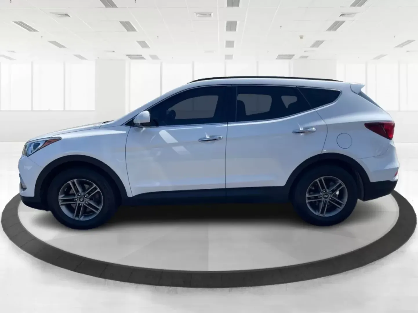 2017 Hyundai Santa Fe 2.4L (5XYZU3LB3HG) with an Theta II 2.4L I-4 gasoline direct injection engine, located at 1230 East Main St, Xenia, OH, 45385, (937) 908-9800, 39.688026, -83.910172 - Are you ready to elevate your family adventures with a premium SUV that seamlessly blends style, comfort, and reliability? Look no further than this stunning 2017 Hyundai Santa Fe, available now at Advantage Car and Credit in Fairborn, OH. Whether you're commuting to work, heading out on a family ro - Photo#5