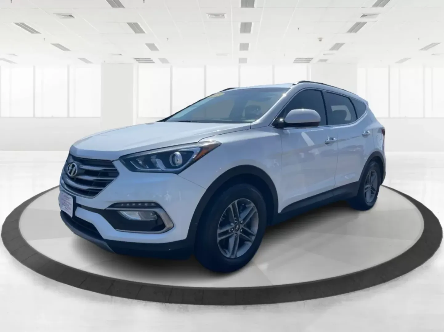 2017 Hyundai Santa Fe 2.4L (5XYZU3LB3HG) with an Theta II 2.4L I-4 gasoline direct injection engine, located at 1230 East Main St, Xenia, OH, 45385, (937) 908-9800, 39.688026, -83.910172 - Are you ready to elevate your family adventures with a premium SUV that seamlessly blends style, comfort, and reliability? Look no further than this stunning 2017 Hyundai Santa Fe, available now at Advantage Car and Credit in Fairborn, OH. Whether you're commuting to work, heading out on a family ro - Photo#8