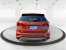 2017 Hyundai Santa Fe 2.0T Ultimate (5XYZW4LA5HG) with an Theta II 2L I-4 gasoline direct injection engine, located at 1184 Kauffman Ave, Fairborn, OH, 45324, (937) 908-9800, 39.807072, -84.030914 - Are you ready to elevate your family adventures or commute comfortably while tackling any road with confidence? Look no further than this 2017 Hyundai Santa Fe 2.0T Ultimate, available now at Advantage Car and Credit in Fairborn, OH. This SUV is not just a vehicle; it's your ticket to creating unfor - Photo#3