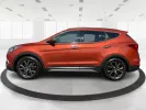 2017 Hyundai Santa Fe 2.0T Ultimate (5XYZW4LA5HG) with an Theta II 2L I-4 gasoline direct injection engine, located at 1184 Kauffman Ave, Fairborn, OH, 45324, (937) 908-9800, 39.807072, -84.030914 - Are you ready to elevate your family adventures or commute comfortably while tackling any road with confidence? Look no further than this 2017 Hyundai Santa Fe 2.0T Ultimate, available now at Advantage Car and Credit in Fairborn, OH. This SUV is not just a vehicle; it's your ticket to creating unfor - Photo#5