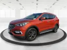 2017 Hyundai Santa Fe 2.0T Ultimate (5XYZW4LA5HG) with an Theta II 2L I-4 gasoline direct injection engine, located at 1184 Kauffman Ave, Fairborn, OH, 45324, (937) 908-9800, 39.807072, -84.030914 - Are you ready to elevate your family adventures or commute comfortably while tackling any road with confidence? Look no further than this 2017 Hyundai Santa Fe 2.0T Ultimate, available now at Advantage Car and Credit in Fairborn, OH. This SUV is not just a vehicle; it's your ticket to creating unfor - Photo#8