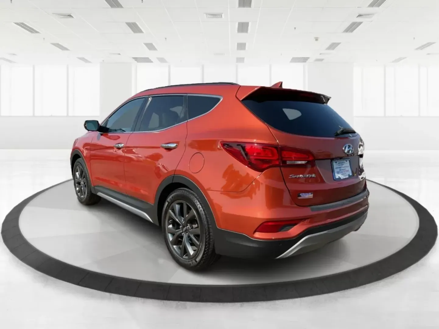 2017 Hyundai Santa Fe 2.0T Ultimate (5XYZW4LA5HG) with an Theta II 2L I-4 gasoline direct injection engine, located at 1184 Kauffman Ave, Fairborn, OH, 45324, (937) 908-9800, 39.807072, -84.030914 - Are you ready to elevate your family adventures or commute comfortably while tackling any road with confidence? Look no further than this 2017 Hyundai Santa Fe 2.0T Ultimate, available now at Advantage Car and Credit in Fairborn, OH. This SUV is not just a vehicle; it's your ticket to creating unfor - Photo#4