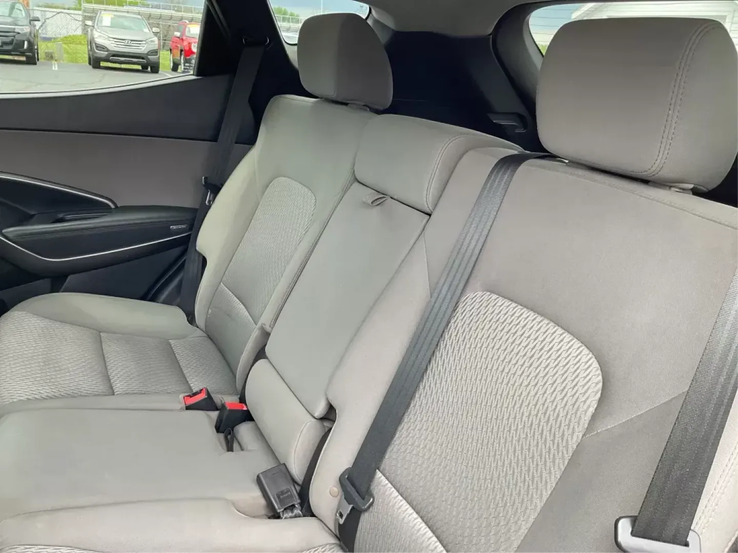 2017 Hyundai Santa Fe 2.4L (5NMZTDLB4HH) with an Theta II 2.4L I-4 gasoline direct injection engine, located at 880 E. National Road, Vandalia, OH, 45377, (937) 908-9800, 39.891918, -84.183594 - **Discover Your Next Adventure with the 2017 Hyundai Santa Fe Sport at Advantage Car and Credit!**<br /> <br /> Are you ready to elevate your lifestyle and embrace the adventures waiting for you? Whether you're a growing family in need of space, a daily commuter looking for comfort, or an outdoor en - Photo#9