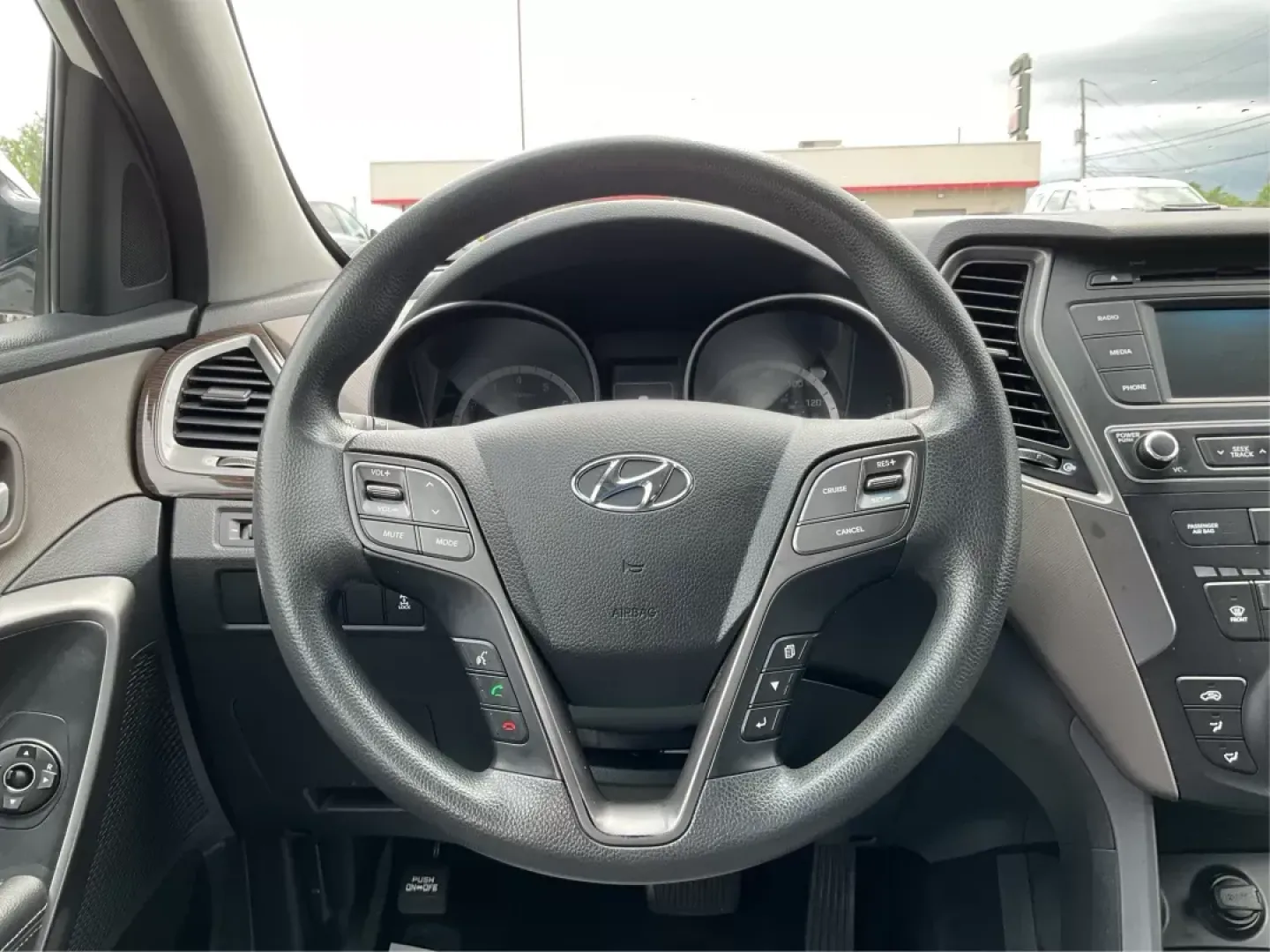 2017 Hyundai Santa Fe 2.4L (5NMZTDLB4HH) with an Theta II 2.4L I-4 gasoline direct injection engine, located at 880 E. National Road, Vandalia, OH, 45377, (937) 908-9800, 39.891918, -84.183594 - **Discover Your Next Adventure with the 2017 Hyundai Santa Fe Sport at Advantage Car and Credit!**<br /> <br /> Are you ready to elevate your lifestyle and embrace the adventures waiting for you? Whether you're a growing family in need of space, a daily commuter looking for comfort, or an outdoor en - Photo#15