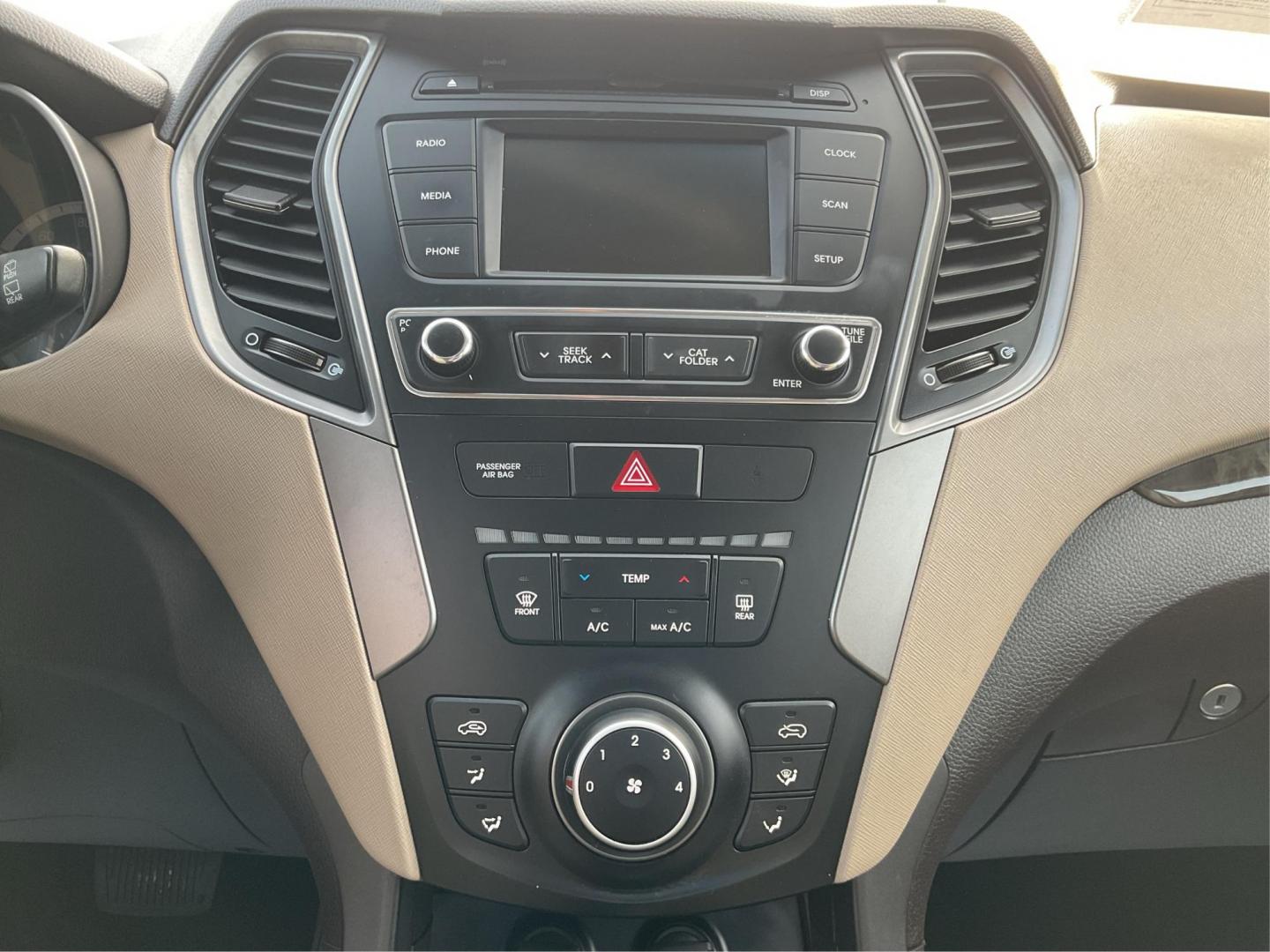 2017 Hyundai Santa Fe Sport 2.4L (5XYZT3LBXHG) with an Theta II 2.4L I-4 gasoline direct injection engine, located at 1099 N County Rd 25A, Troy, OH, 45373, (937) 908-9800, 40.057079, -84.212883 - 2017 Hyundai Santa Fe Sport 2.4L - Photo#12