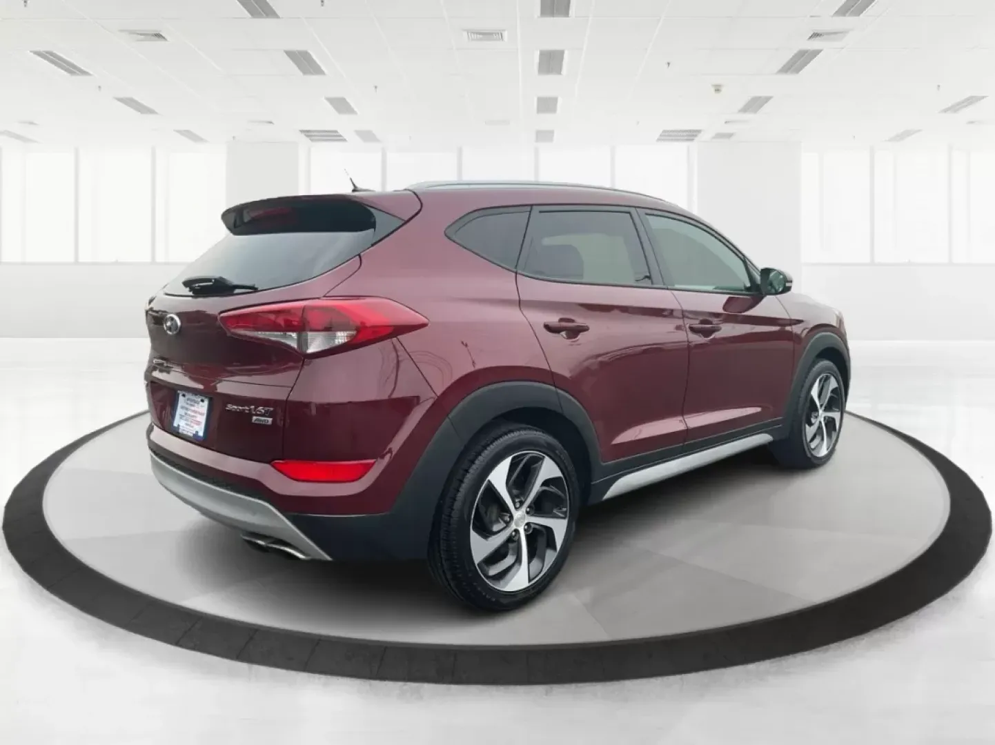 2017 Hyundai Tucson Sport (KM8J3CA29HU) with an 1.6L I-4 gasoline direct injection engine, located at 1099 N County Rd 25A, Troy, OH, 45373, (937) 908-9800, 40.057079, -84.212883 - **Discover Adventure in the 2017 Hyundai Tucson: Your Ideal SUV for Every Journey!**<br /> <br /> Are you ready to elevate your driving experience? The 2017 Hyundai Tucson in striking Ruby Wine is here, tailored for those who crave versatility and reliability in their daily adventures. Whether you'r - Photo#2